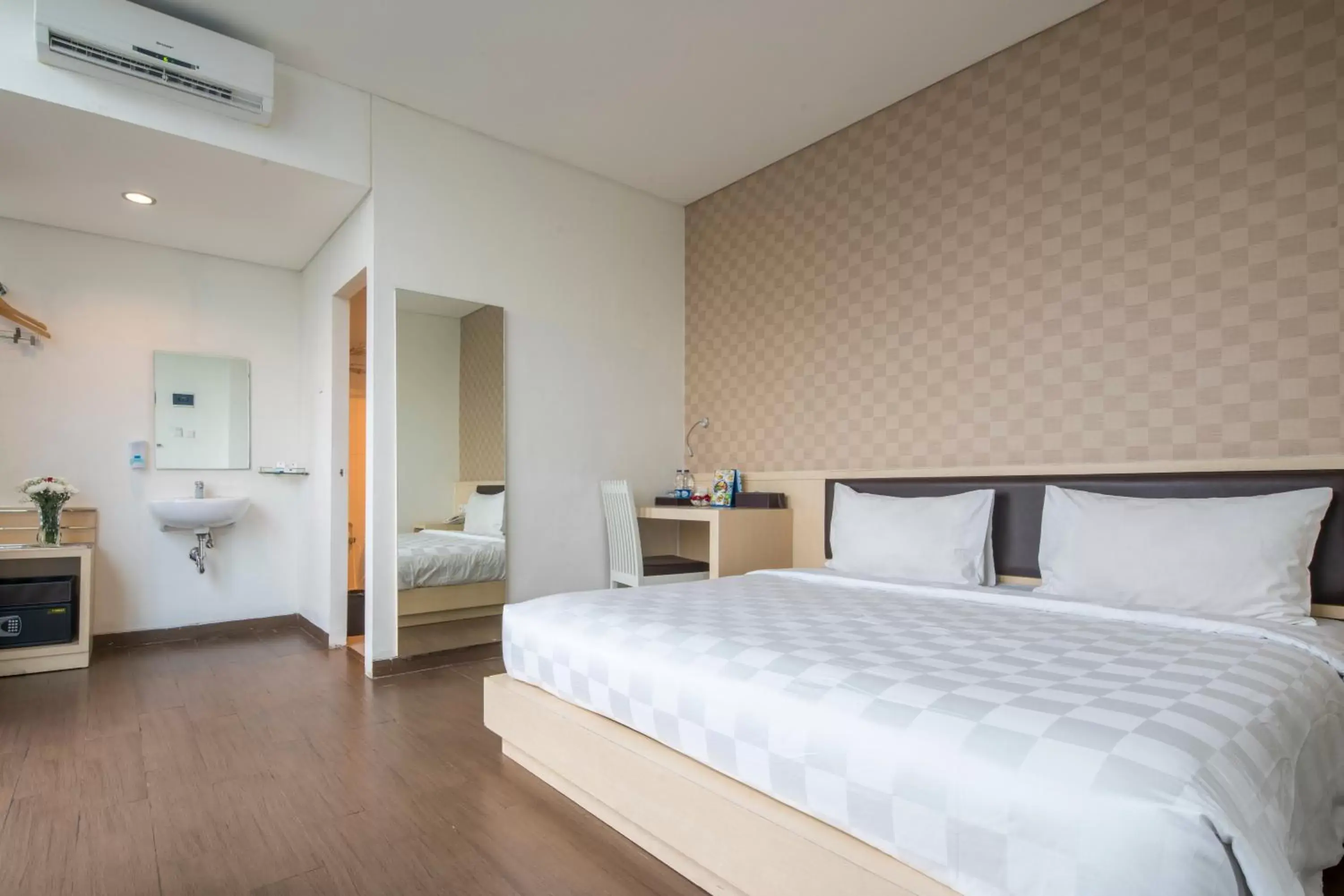 Bedroom, Bed in Hotel 88 Grogol Jakarta By WH