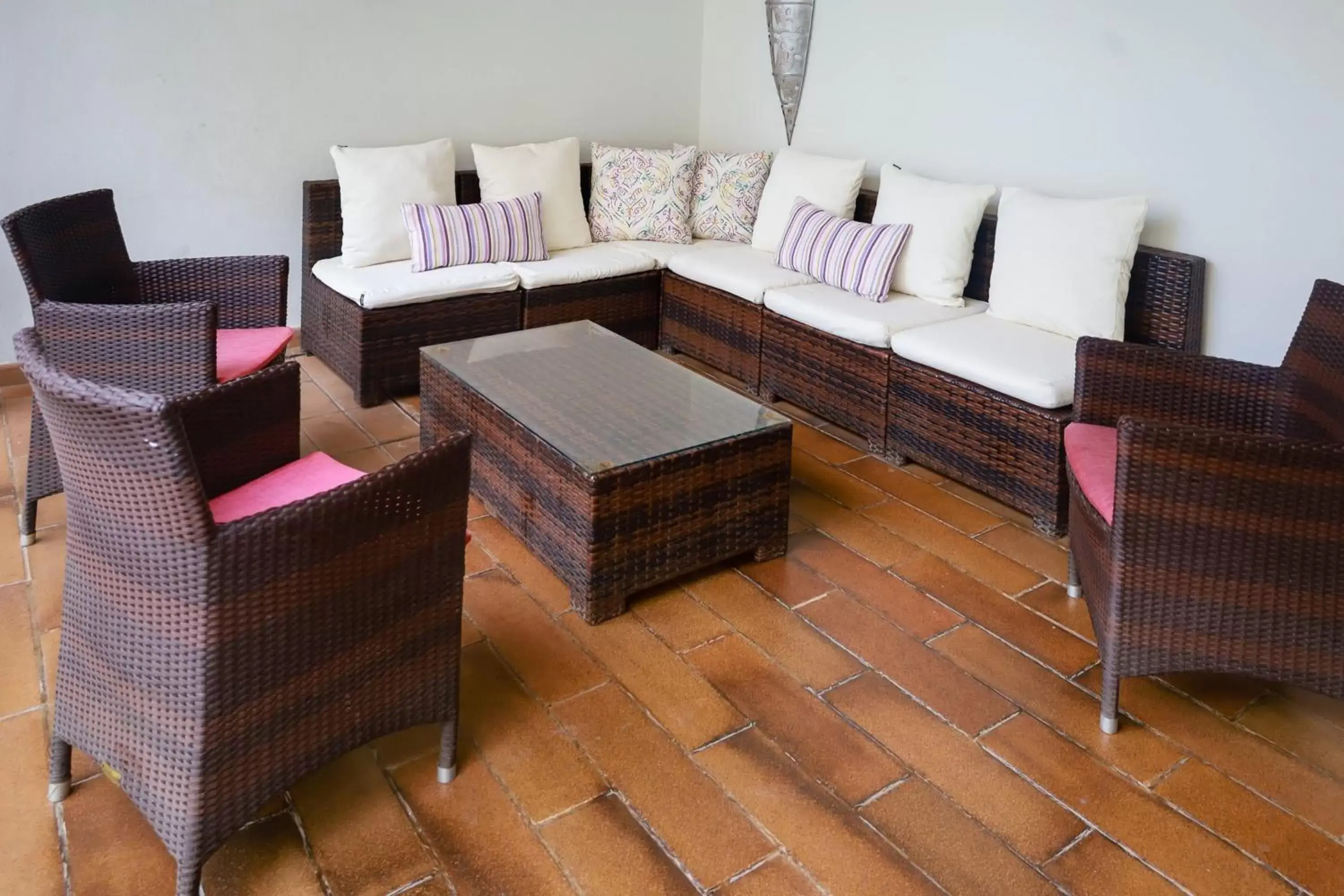 Swimming pool, Seating Area in The Heron Hotel