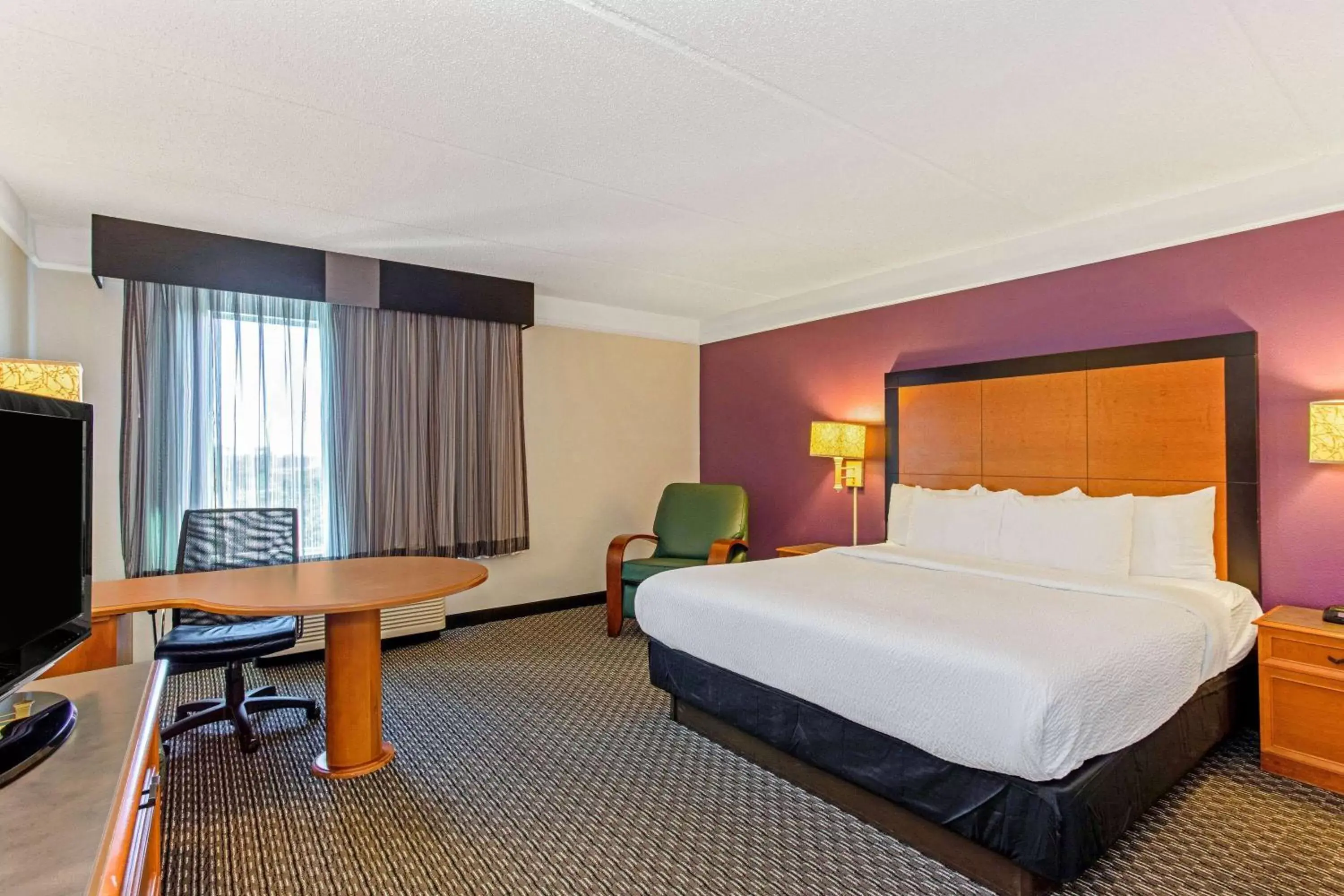 Photo of the whole room, Bed in La Quinta by Wyndham Orlando I Drive/Conv Center