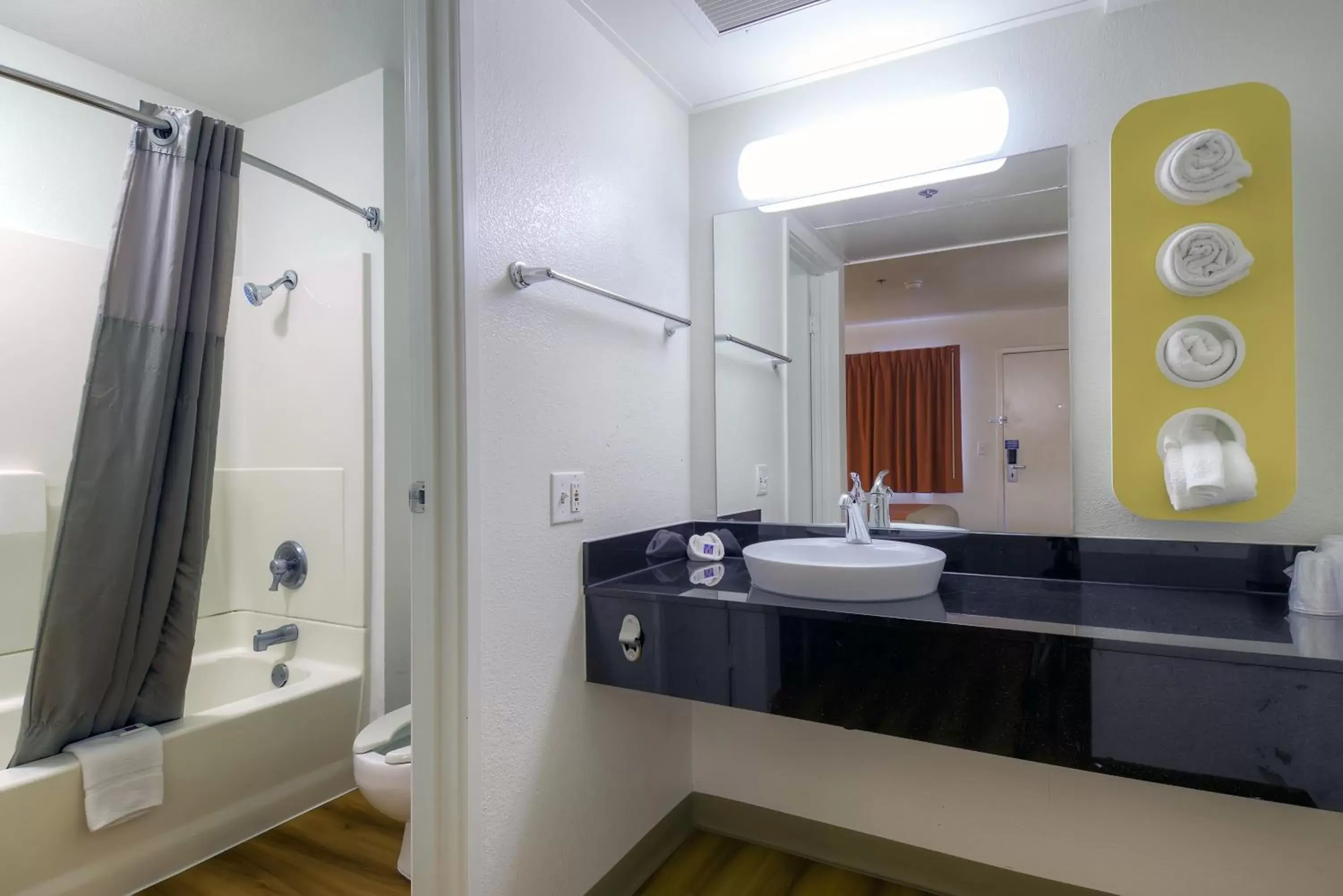 TV and multimedia, Bathroom in Motel 6-Palm Springs, CA - Downtown