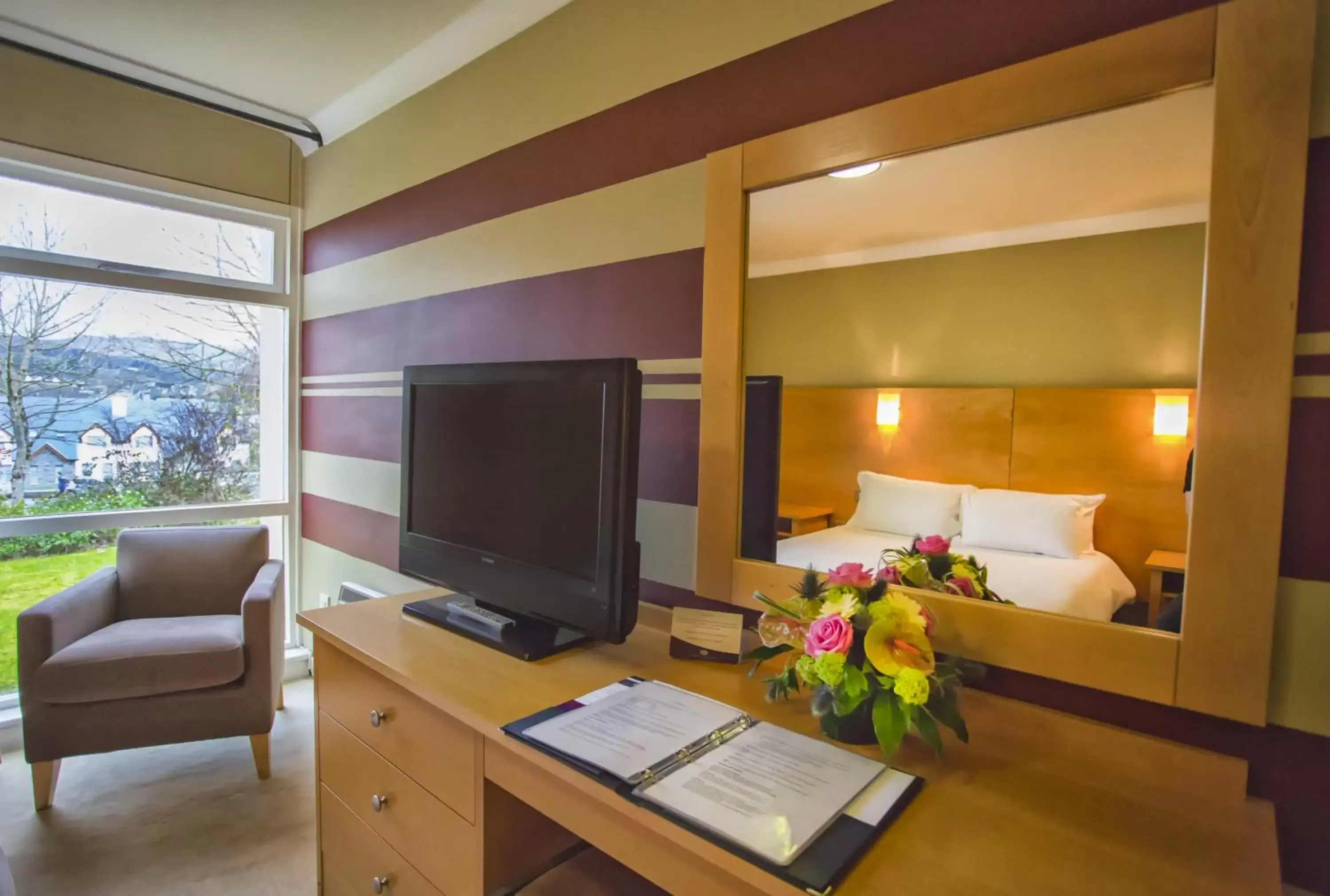 Bedroom, TV/Entertainment Center in The Kenmare Bay Hotel & Leisure Resort