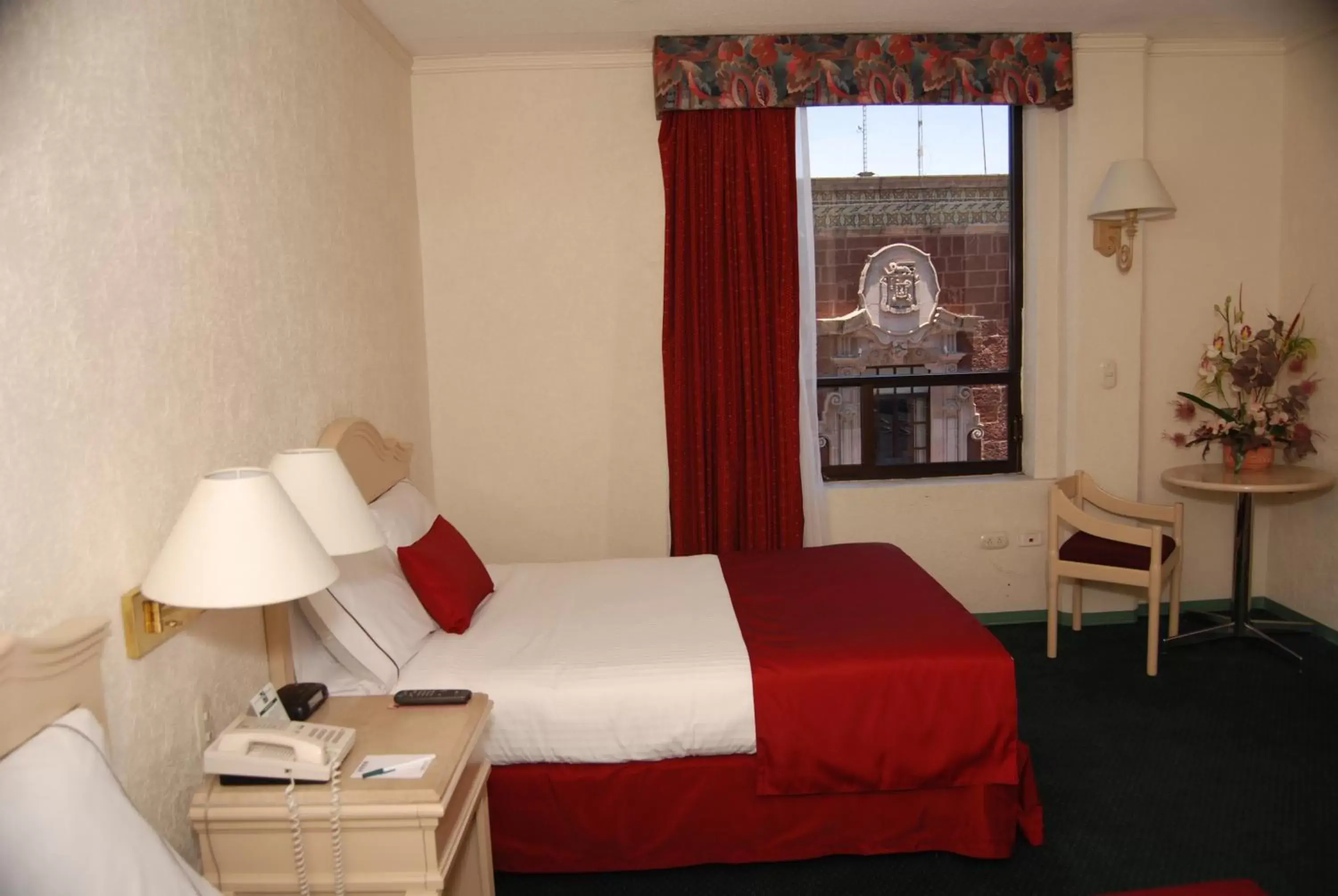 Decorative detail, Bed in Quality Inn Aguascalientes Decorative detail, Bed in Quality Inn Aguascalientes