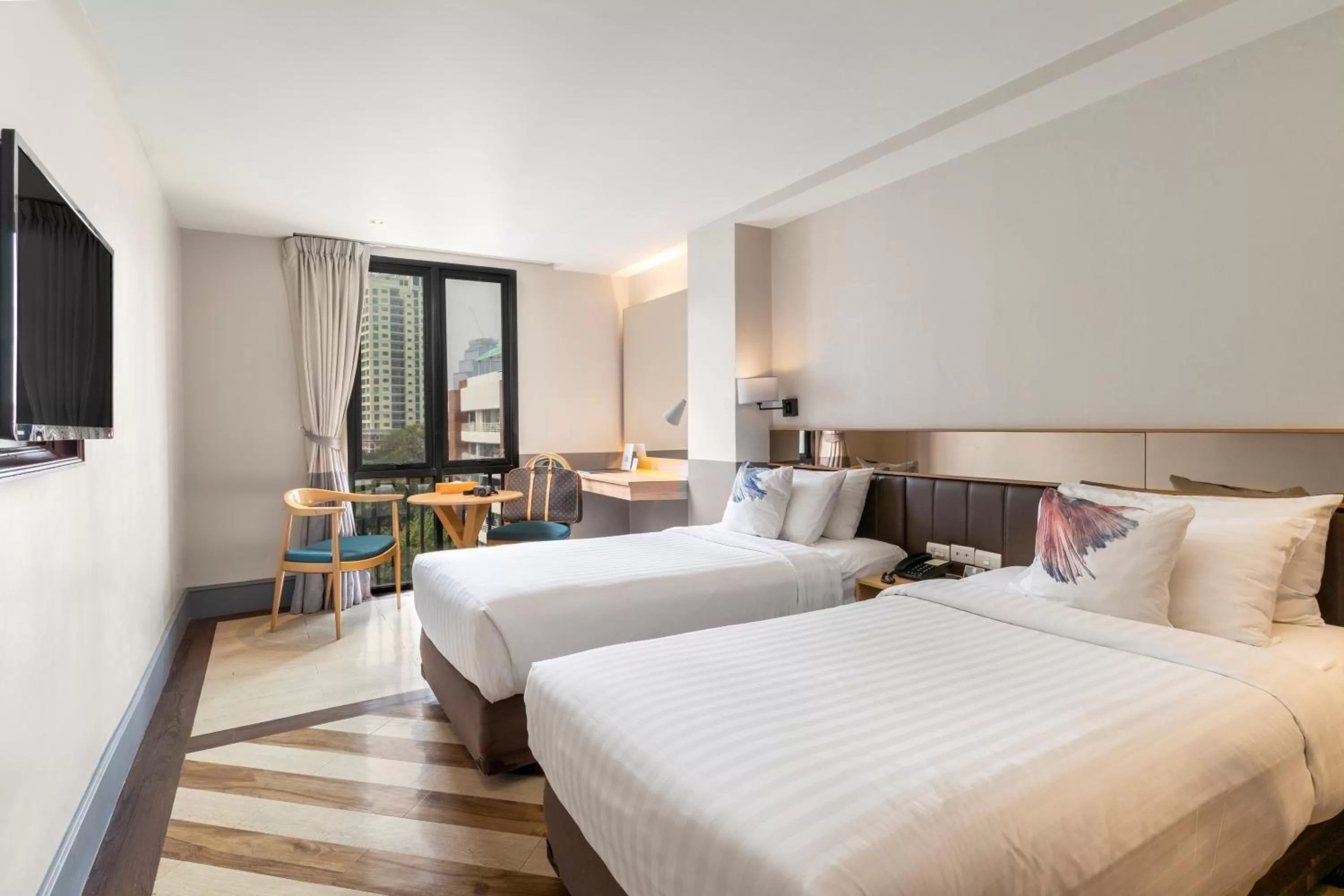 Bed in Vince Hotel Pratunam