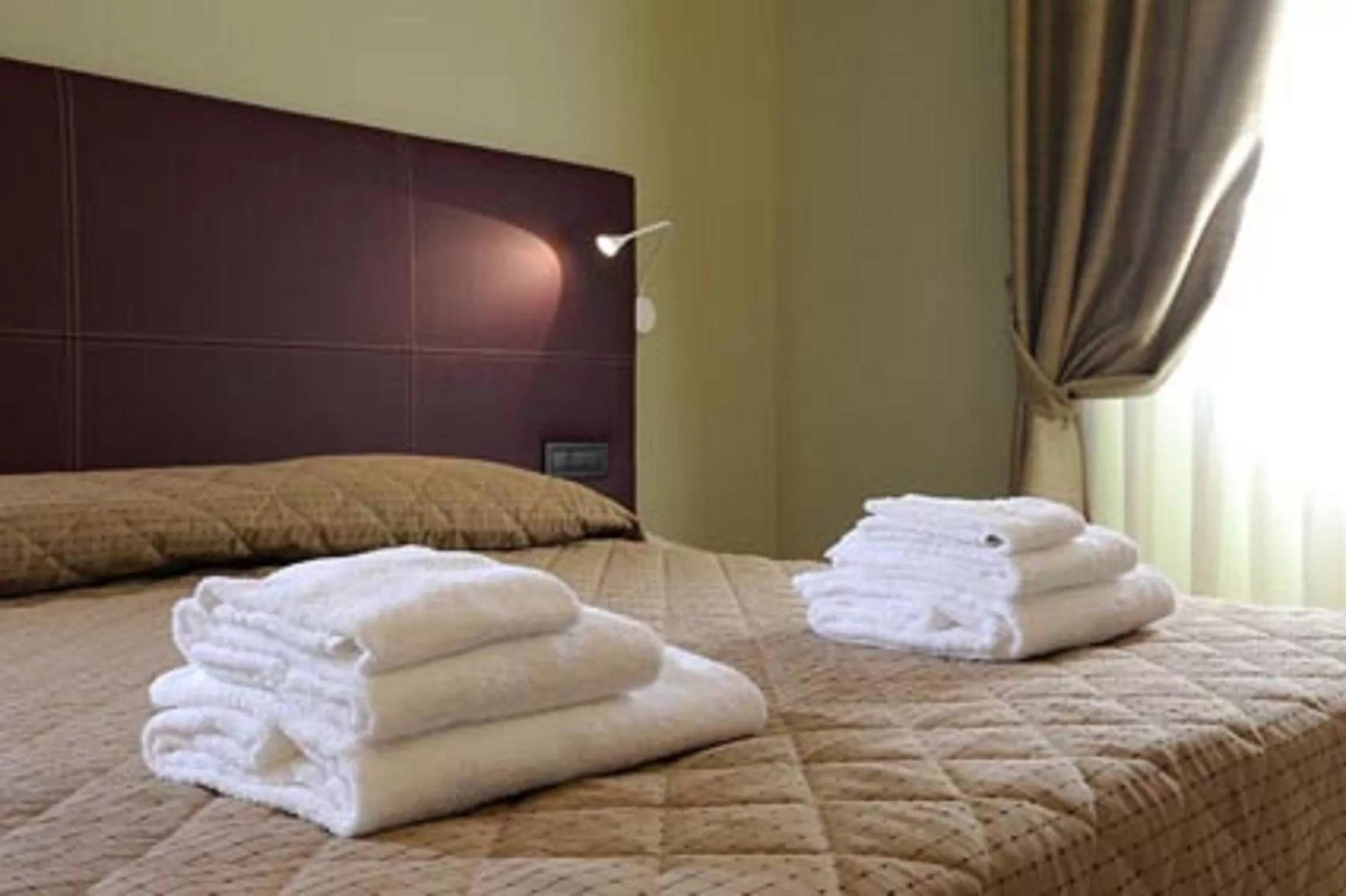 Decorative detail, Bed in Magione Papale Relais