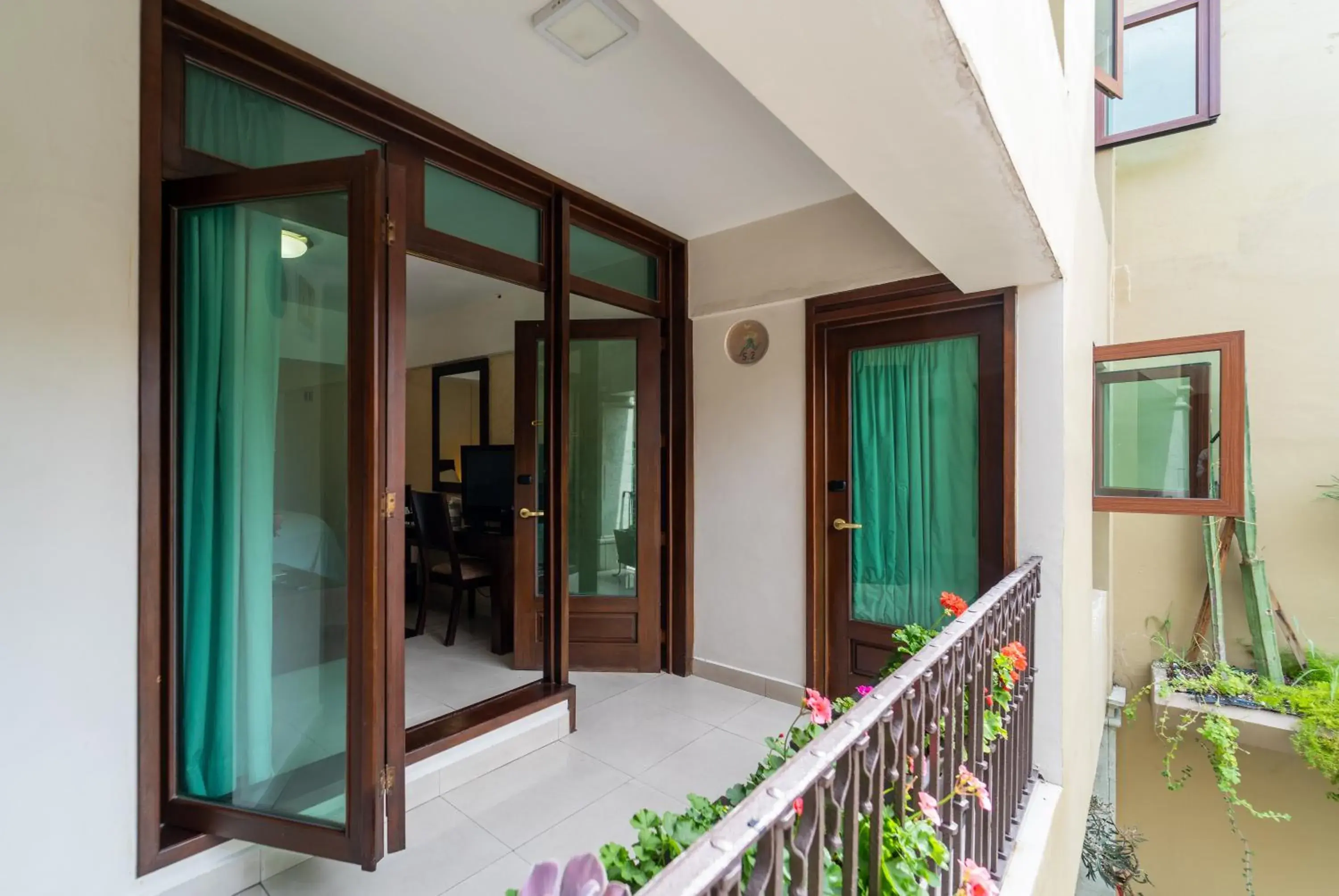 Property building, Balcony/Terrace in Casa de las Flores Hotel