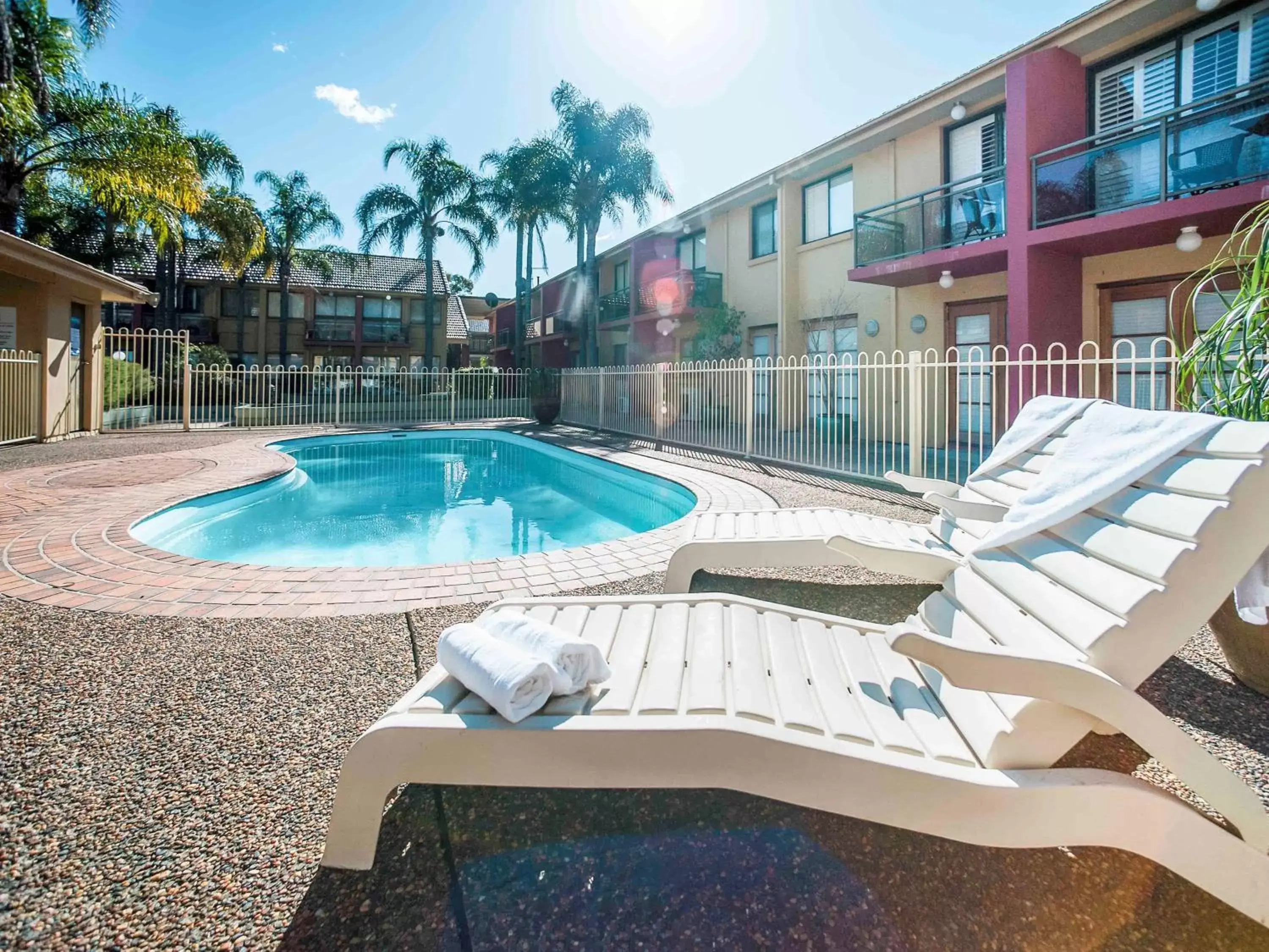 Property building, Swimming Pool in Ramada Hotel & Suites by Wyndham Cabramatta