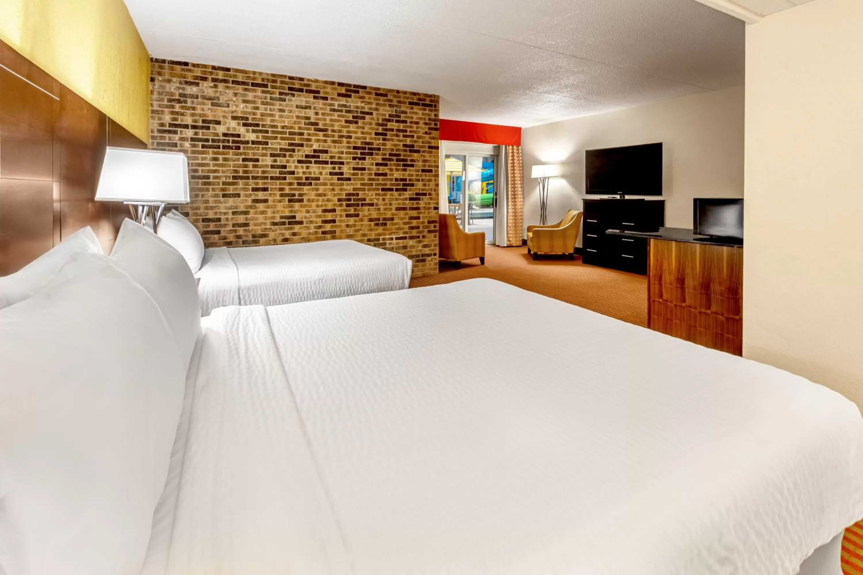 Bed in Grand Williston Hotel and Conference Center