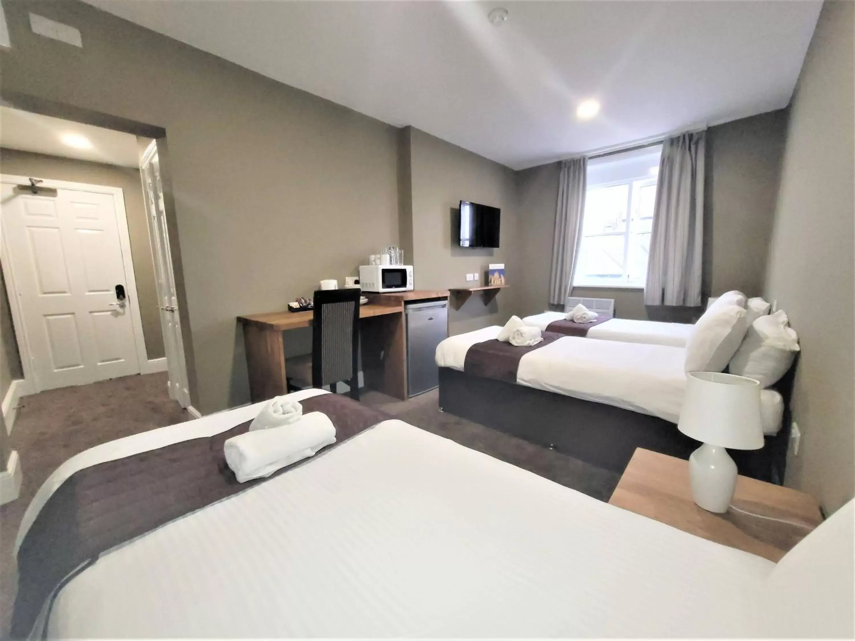 Bed in New County Hotel & Serviced Apartments by RoomsBooked