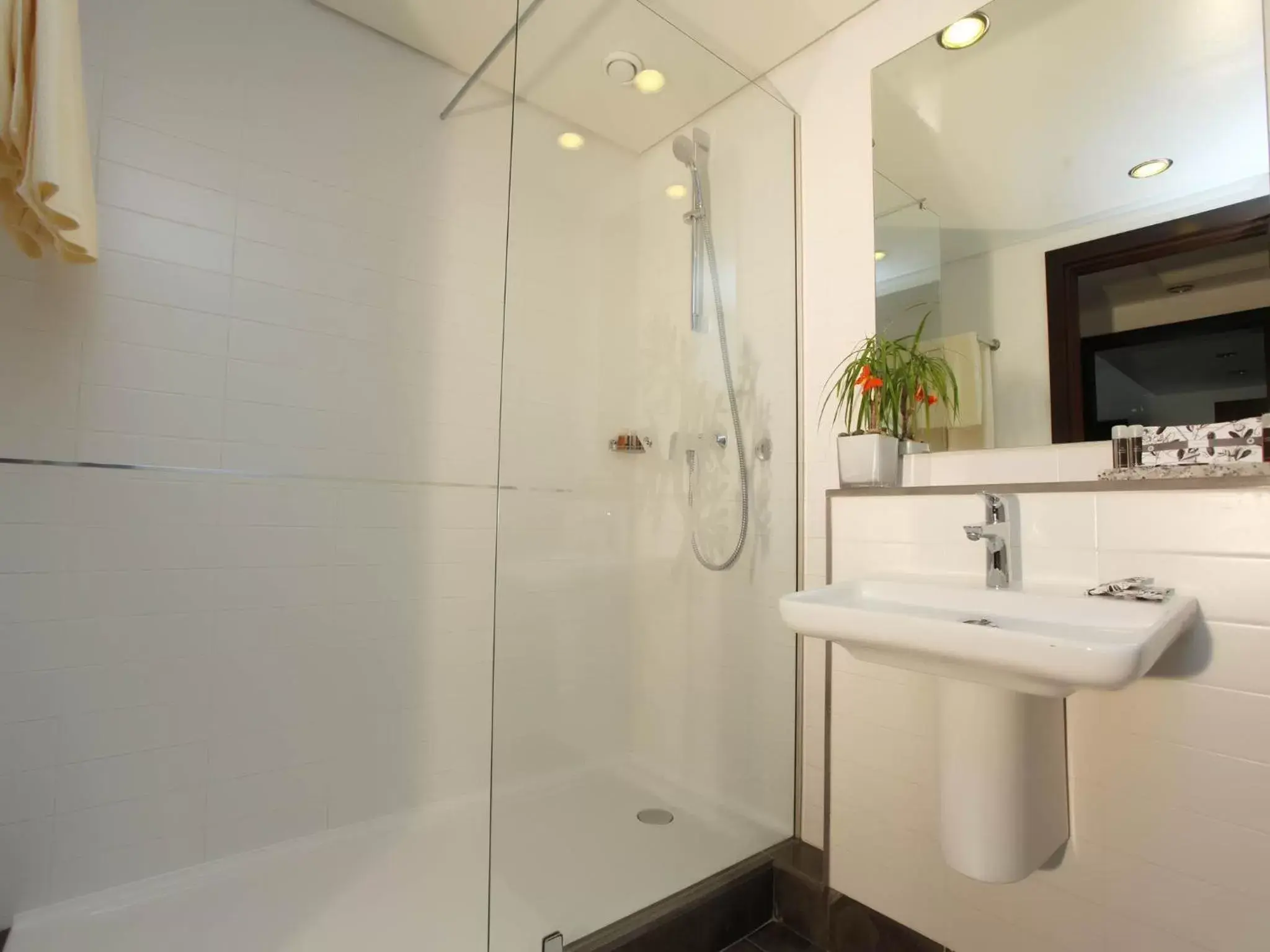 Bathroom in Le Corail Suites Hotel