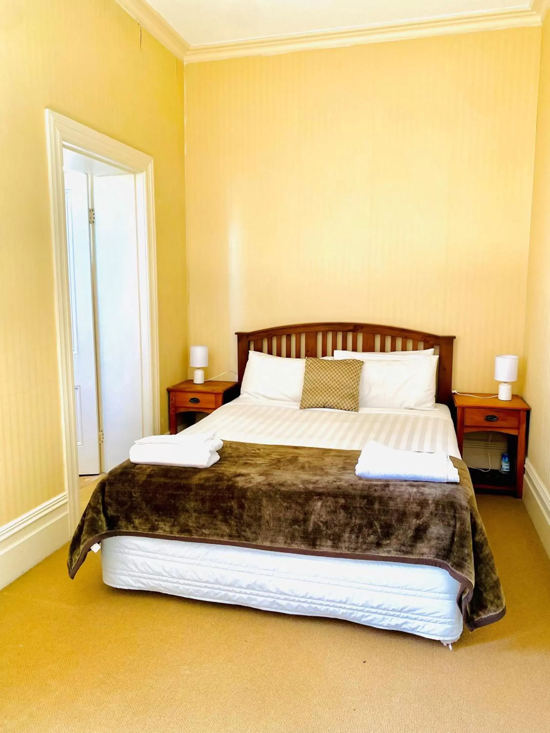 Bed in The Esplanade Hotel Bed in The Esplanade Hotel