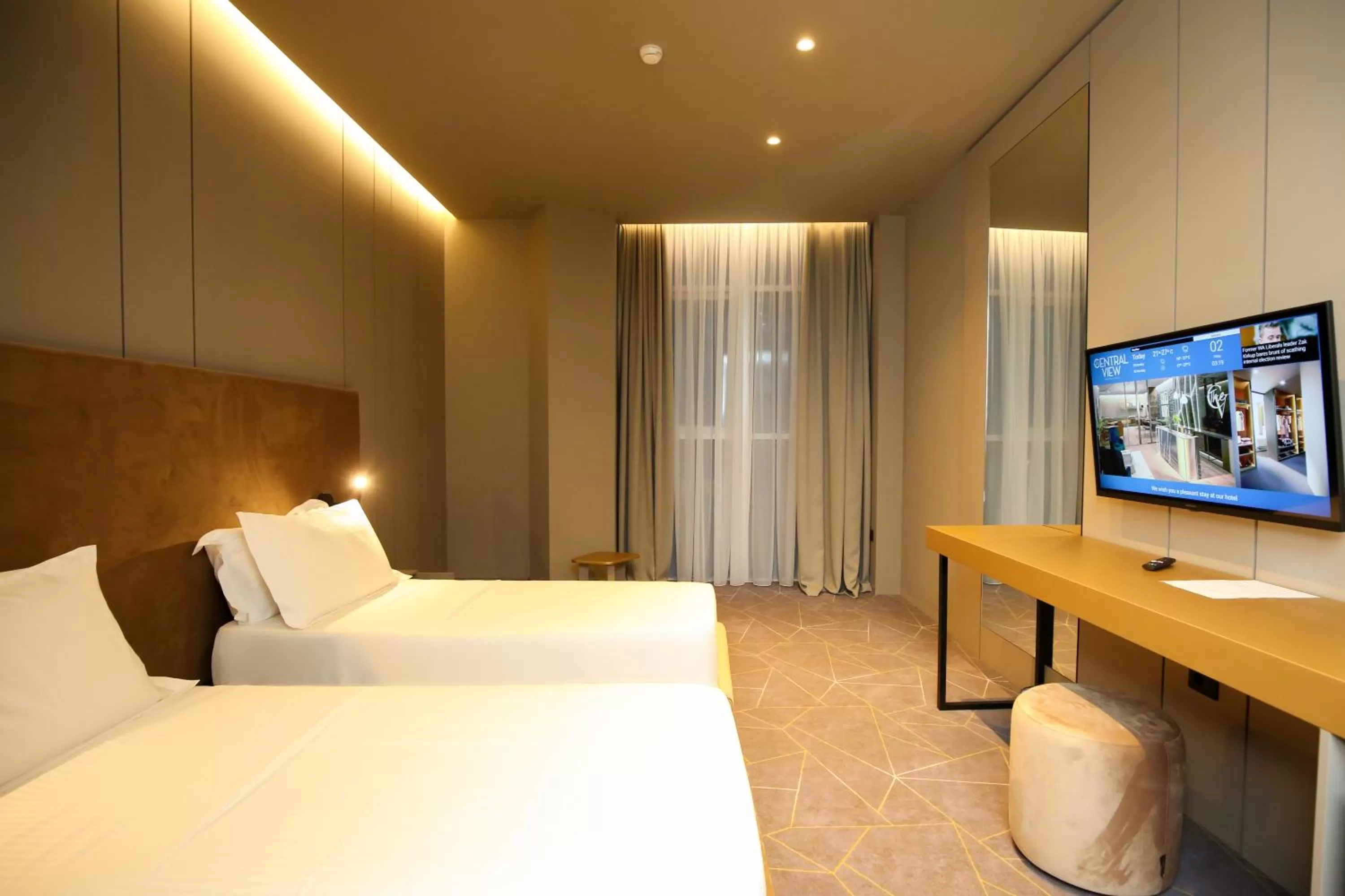 Bed in The Central View Boutique Hotel