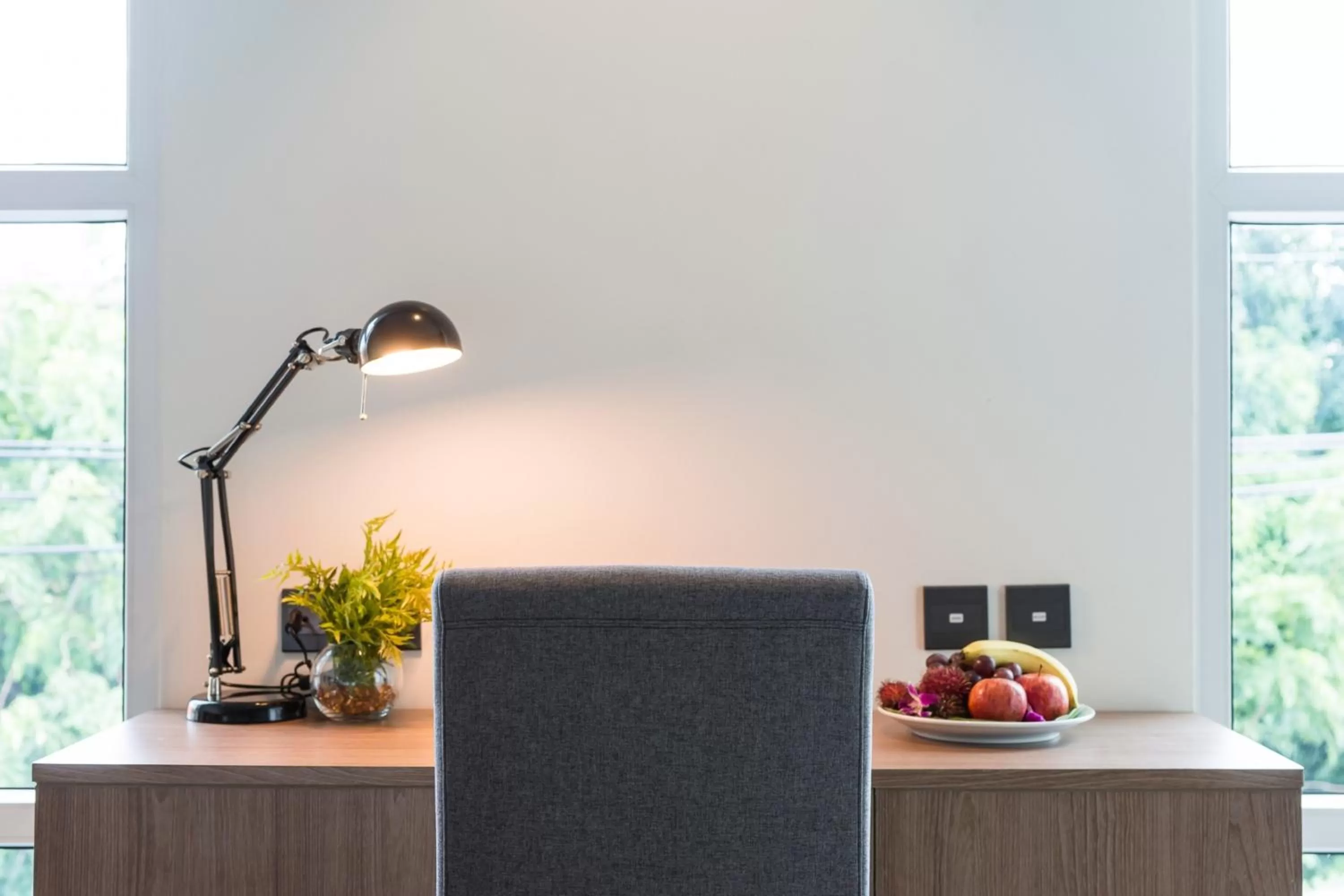 Seating area in SureStay Plus by Best Western T Pattaya