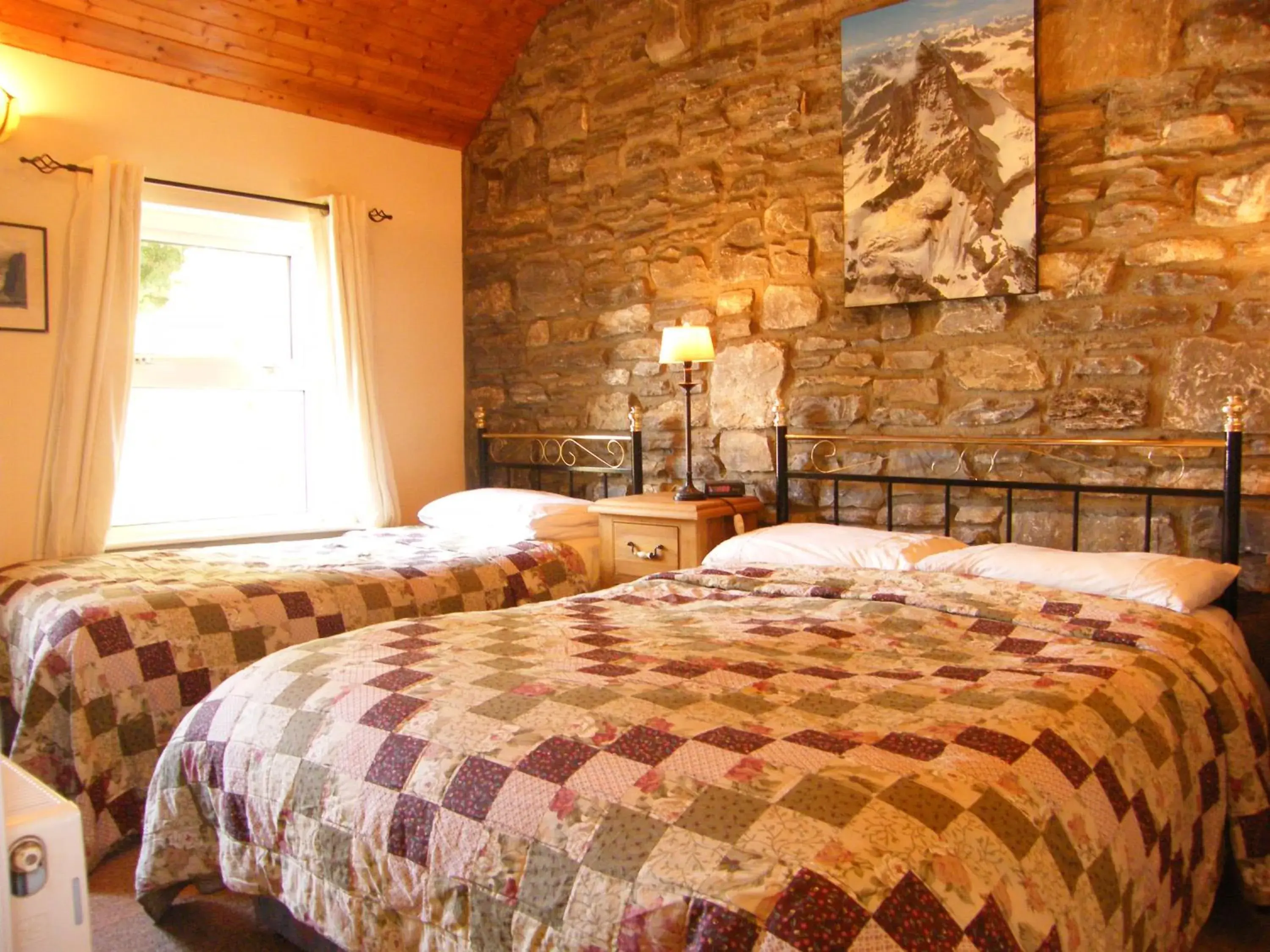 Bed in Druid Cottage