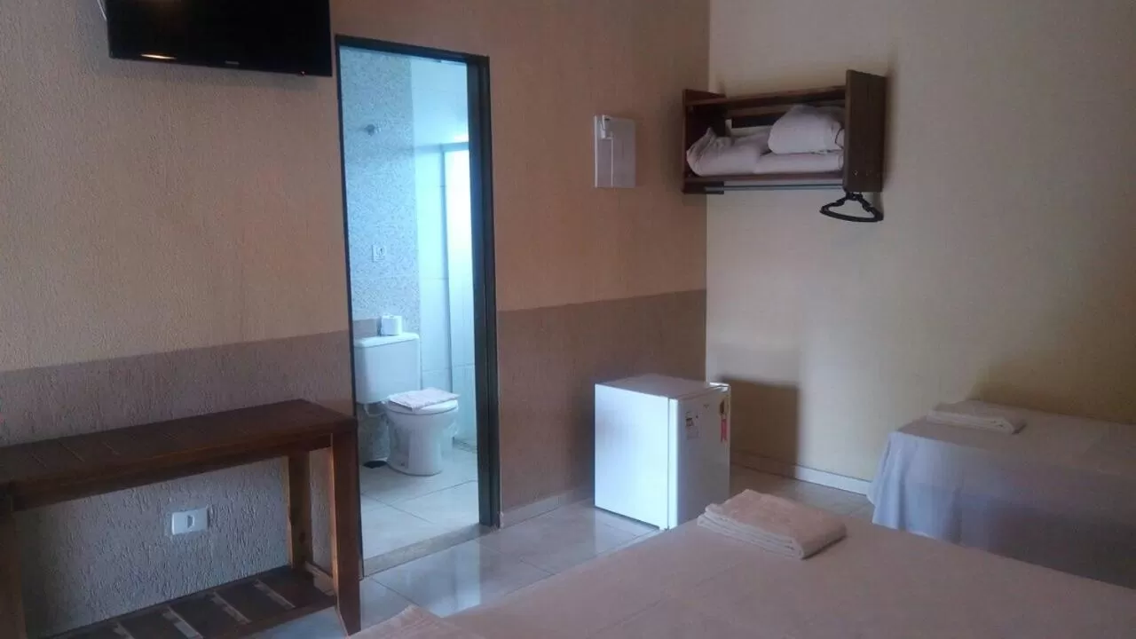 Bed in Pousada Manna