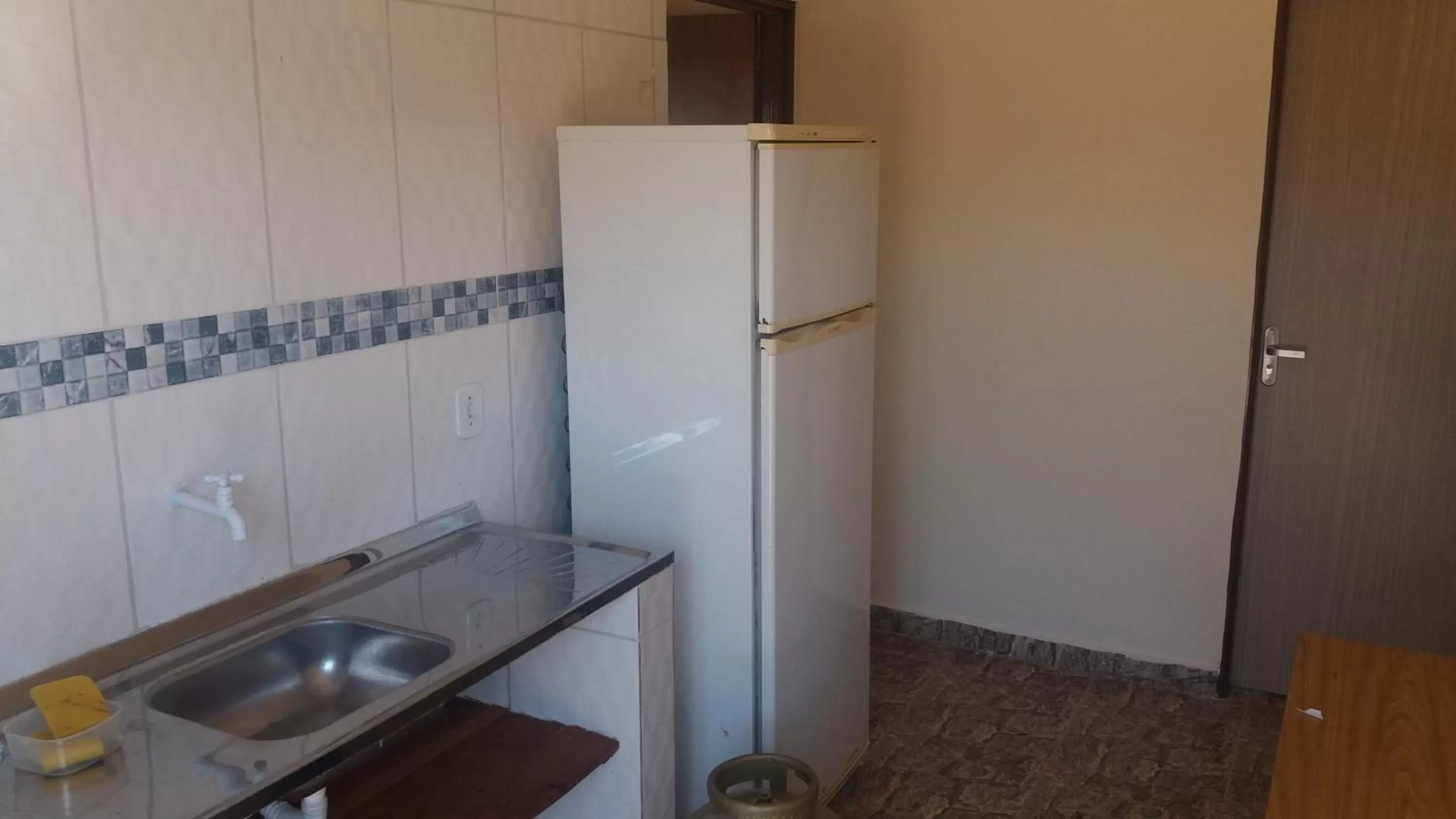 kitchen in ApartHotel Família Meireles