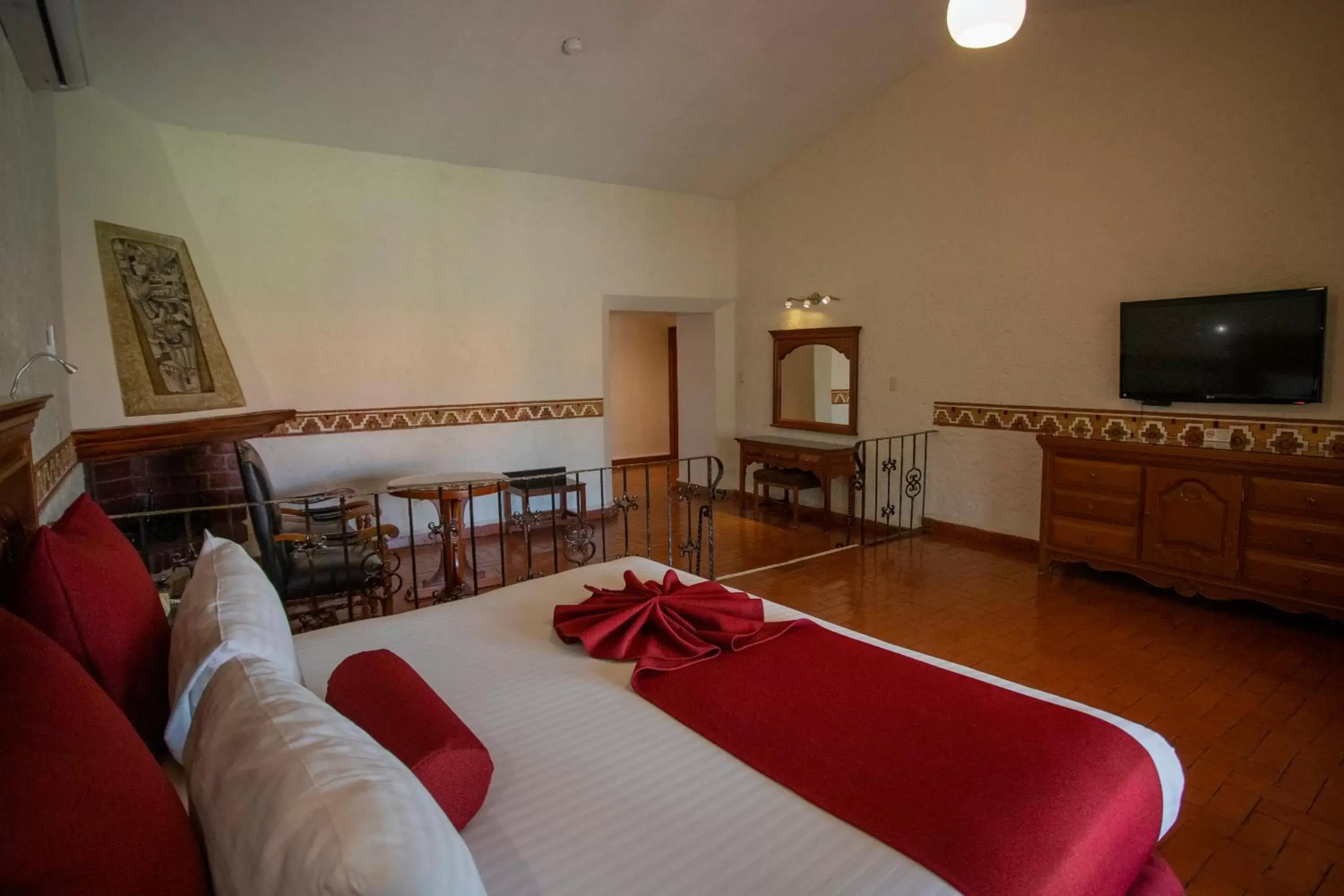 Bed, Seating Area in Hosteria Las Quintas Hotel & Spa