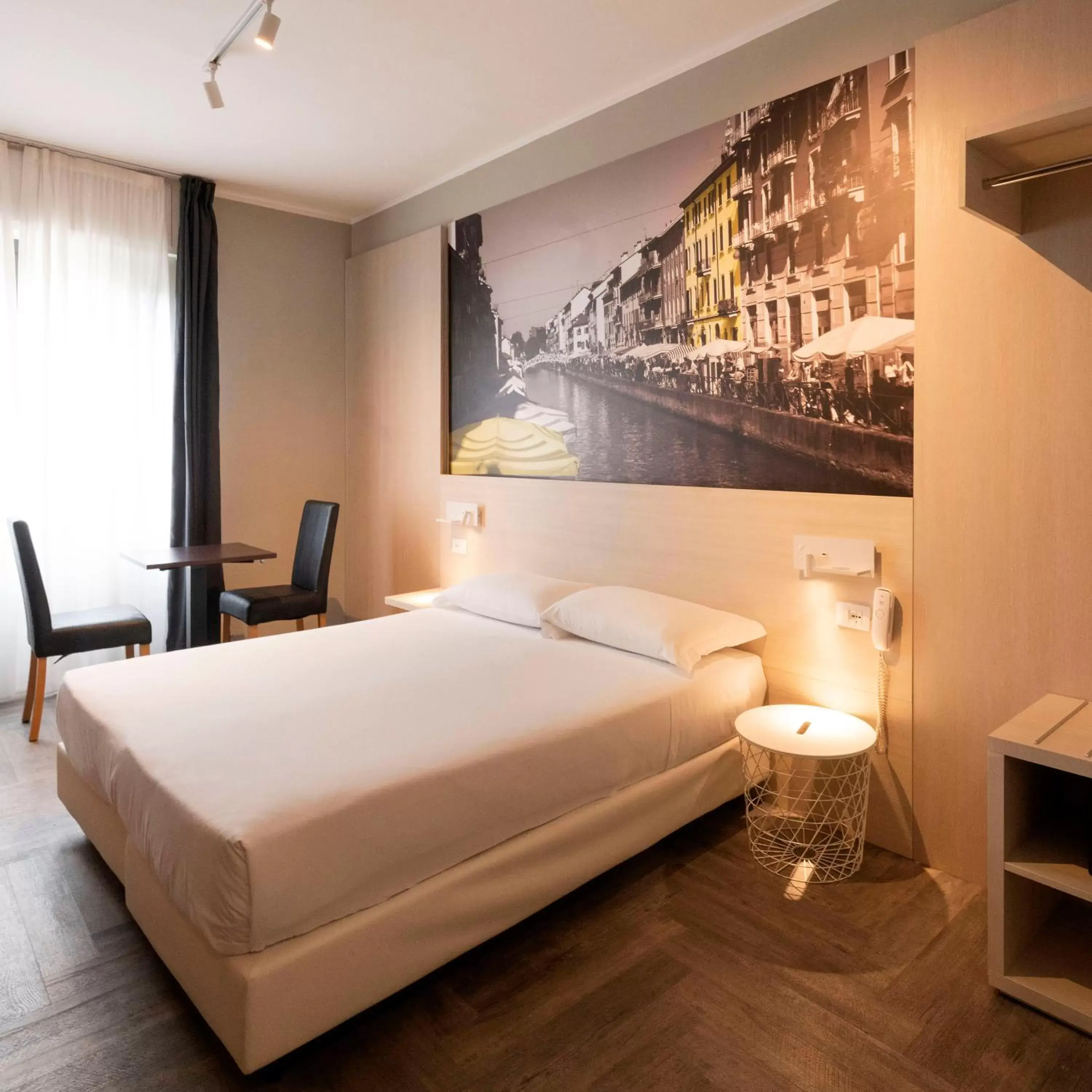 Bed in Kleos Hotel Milano