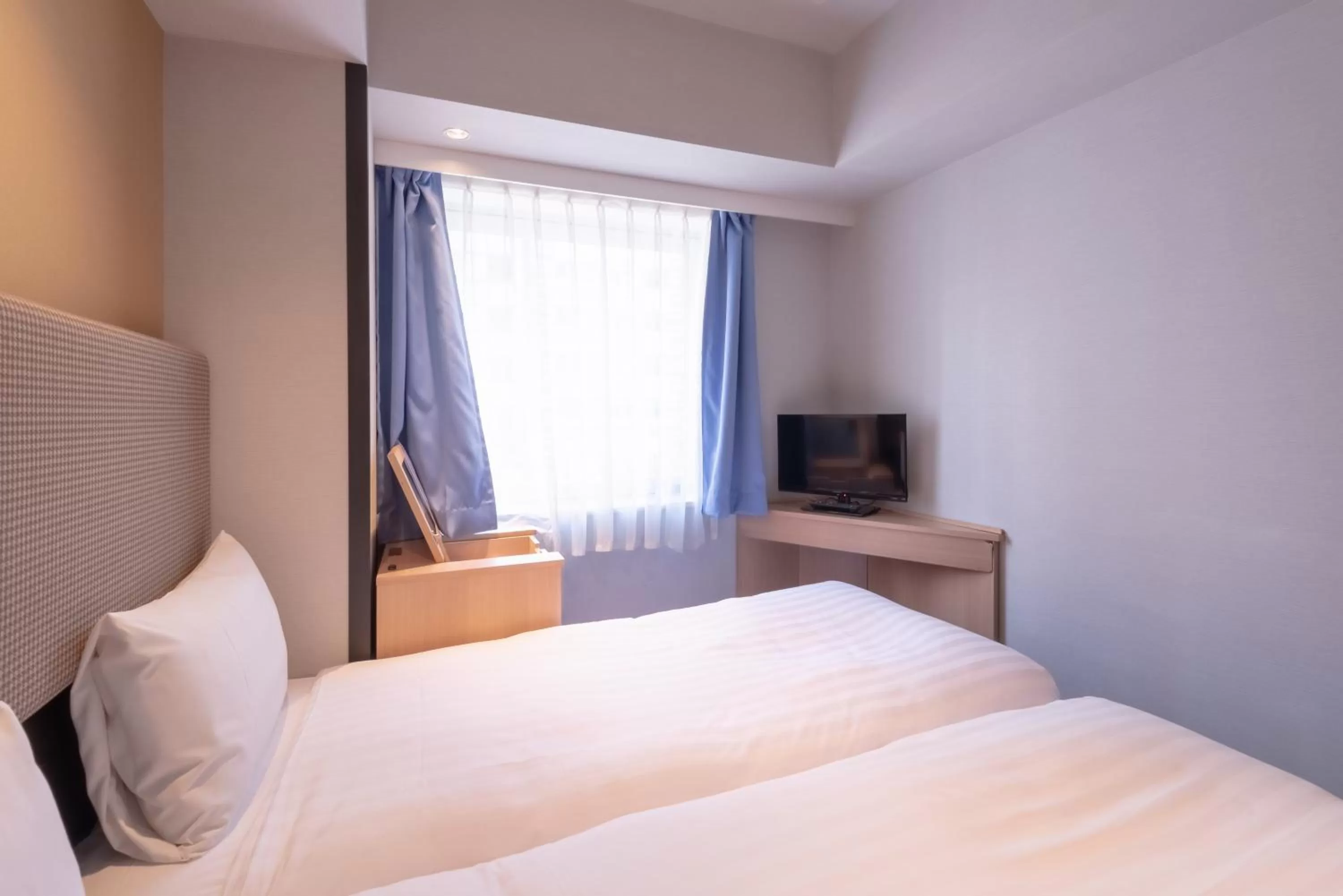 Bed in E Hotel Higashi Shinjuku