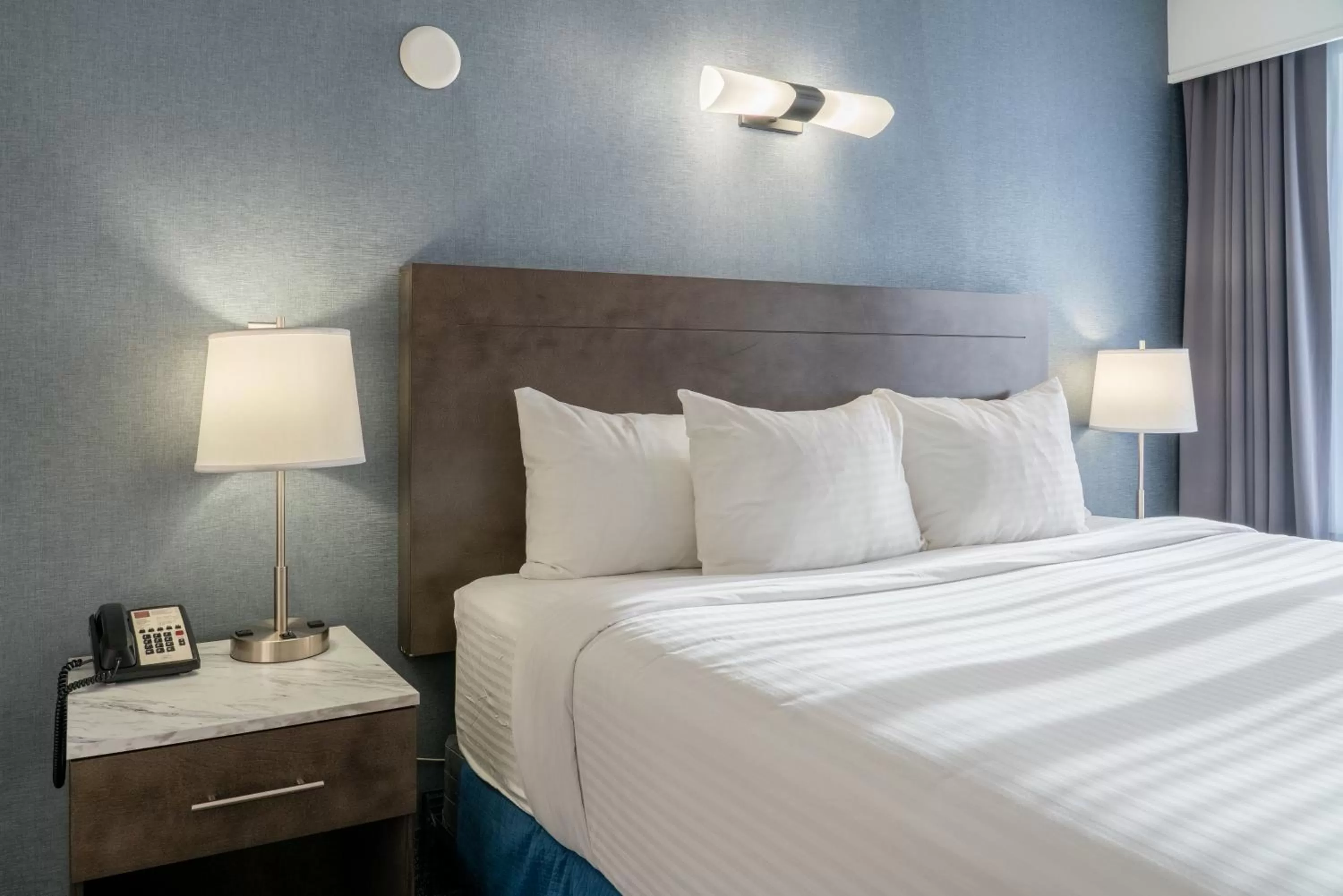 Bed in Red Carpet Inn