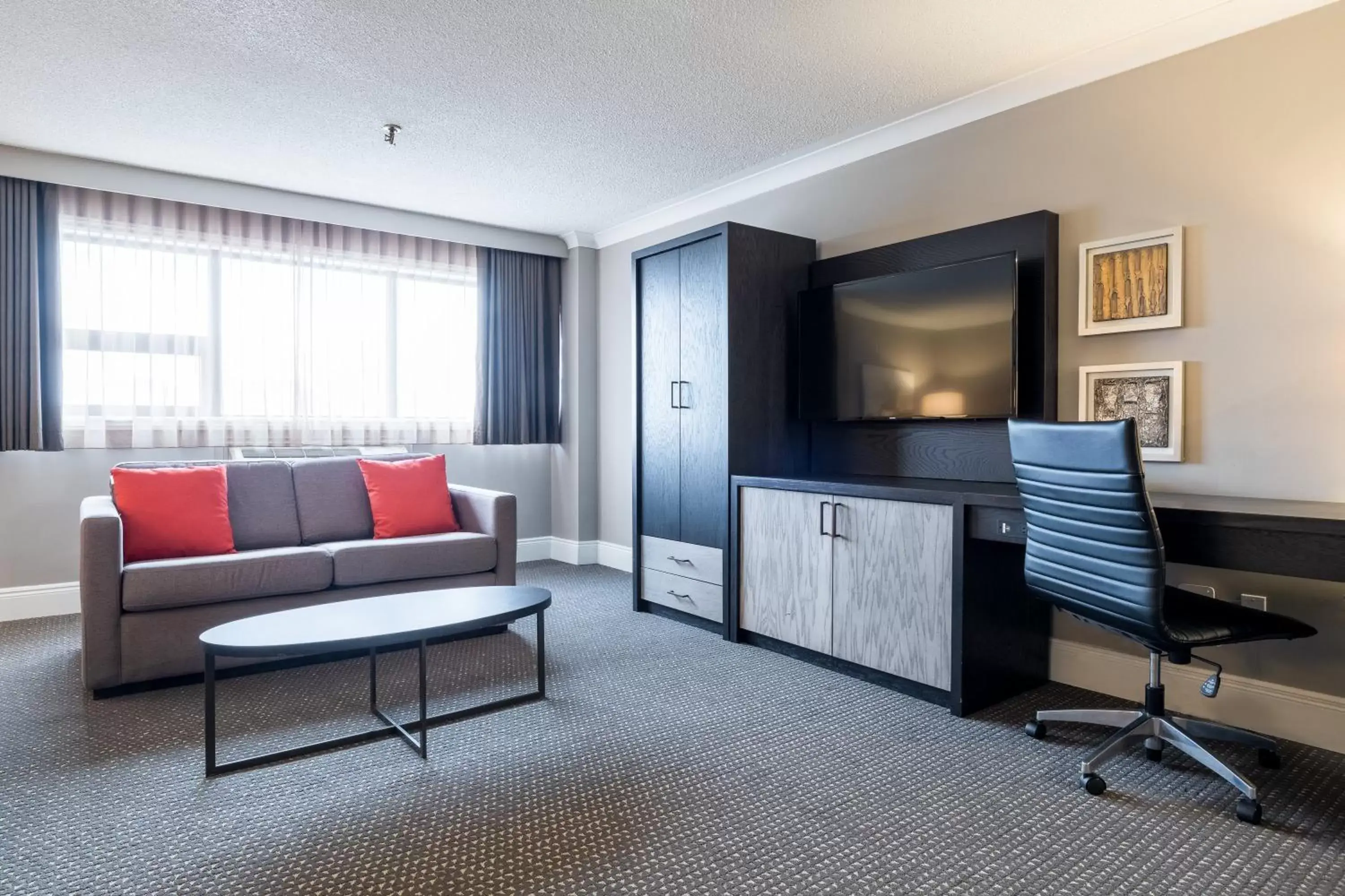 Photo of the whole room, Seating Area in Crowne Plaza Hotel Moncton Downtown, an IHG Hotel