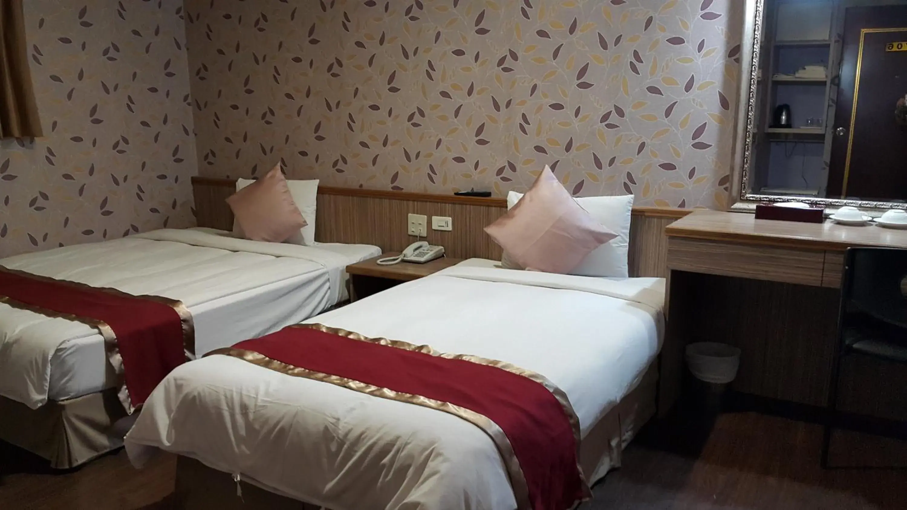 Bed in Mei-Hua Hotel