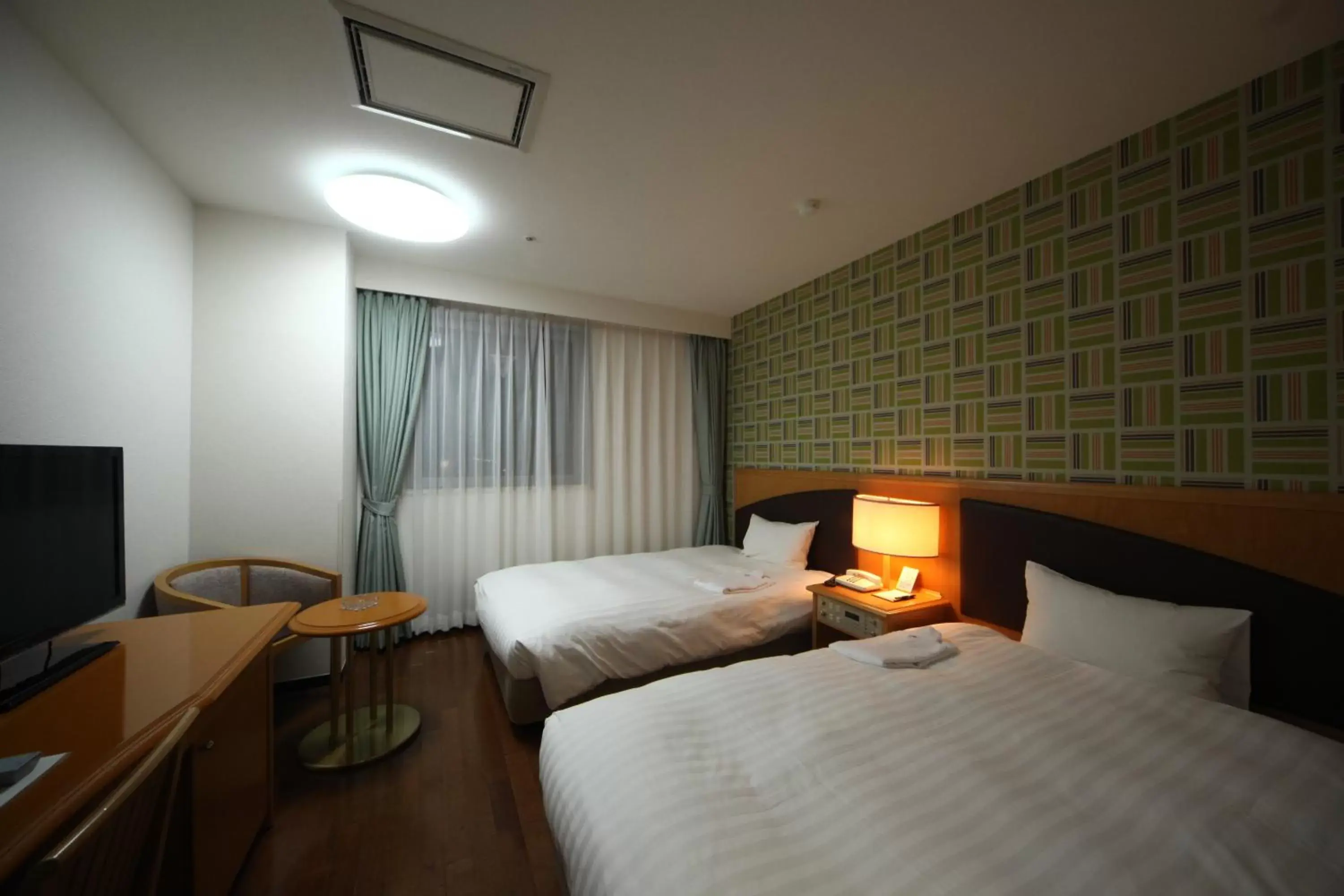 Photo of the whole room, Bed in Hotel Wing International Tomakomai