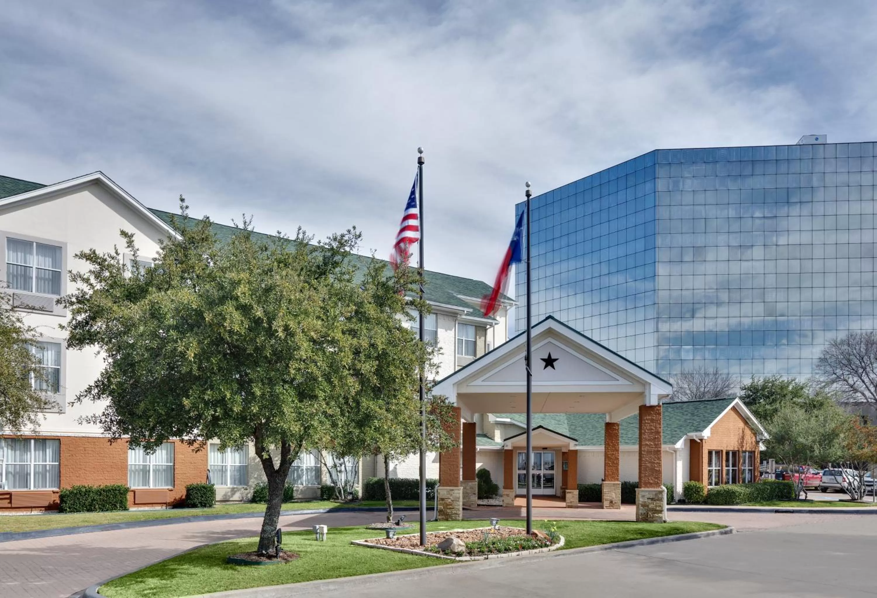 Property building in Candlewood Suites Dallas Market Center-Love Field by IHG