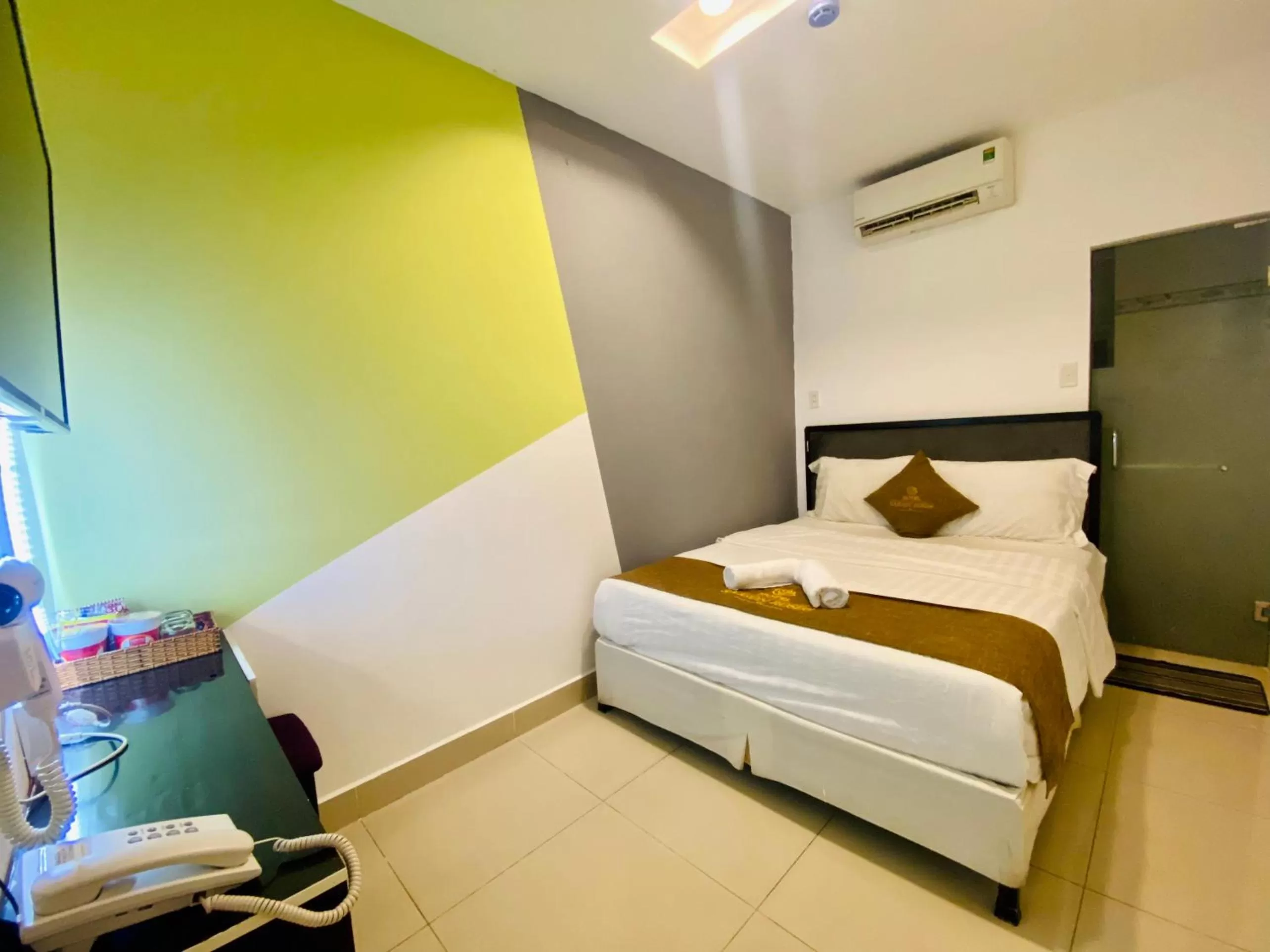 Bed in SaiGon Rose Hotel