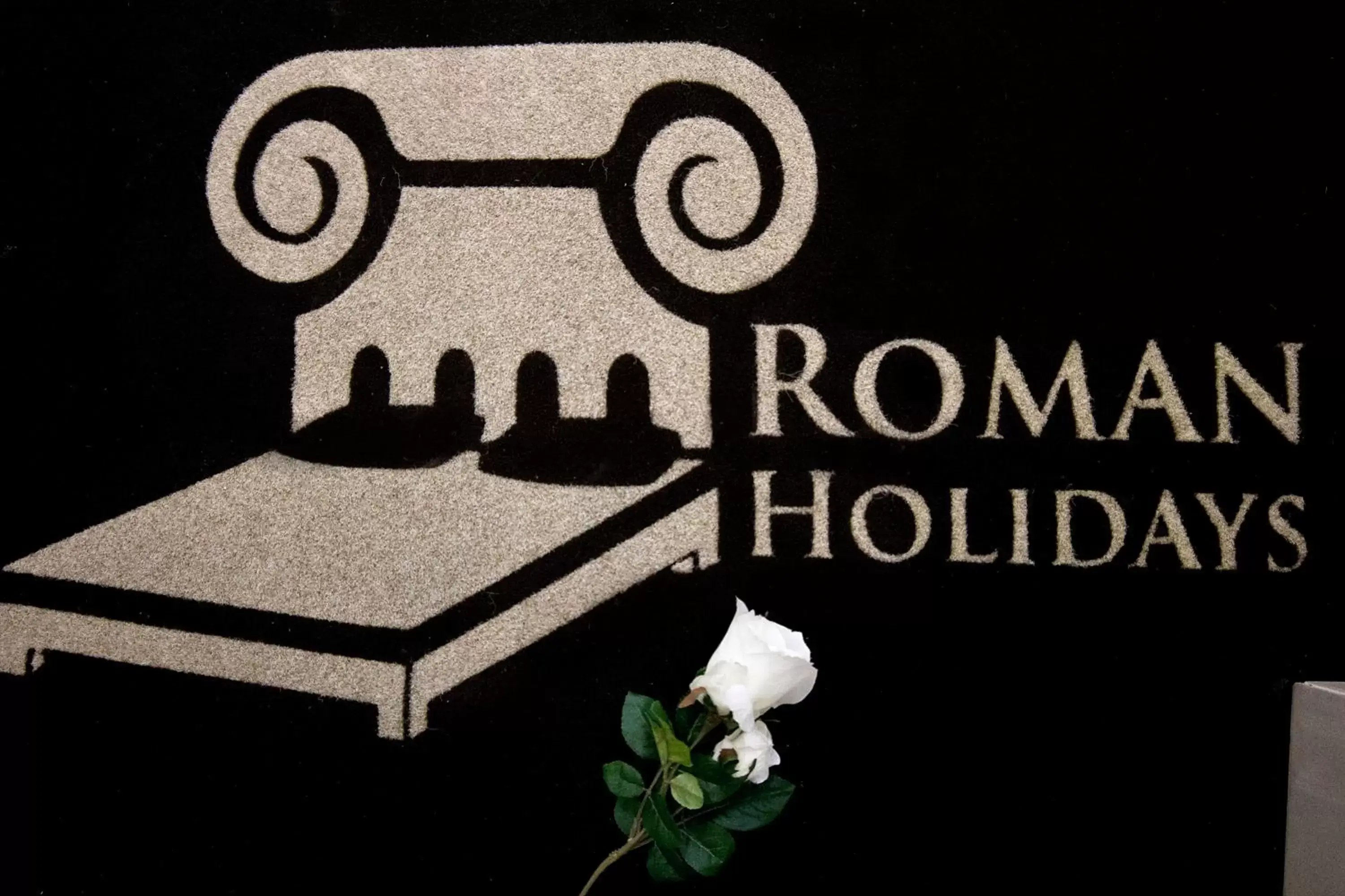 Property logo or sign in Roman Holidays Boutique Hotel