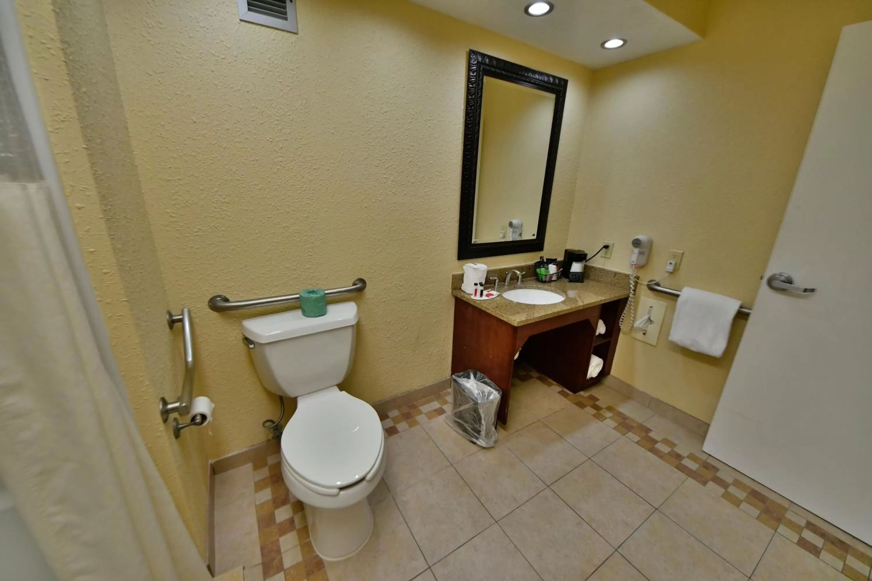 Bathroom in Ramada by Wyndham Jacksonville Hotel & Conference Center