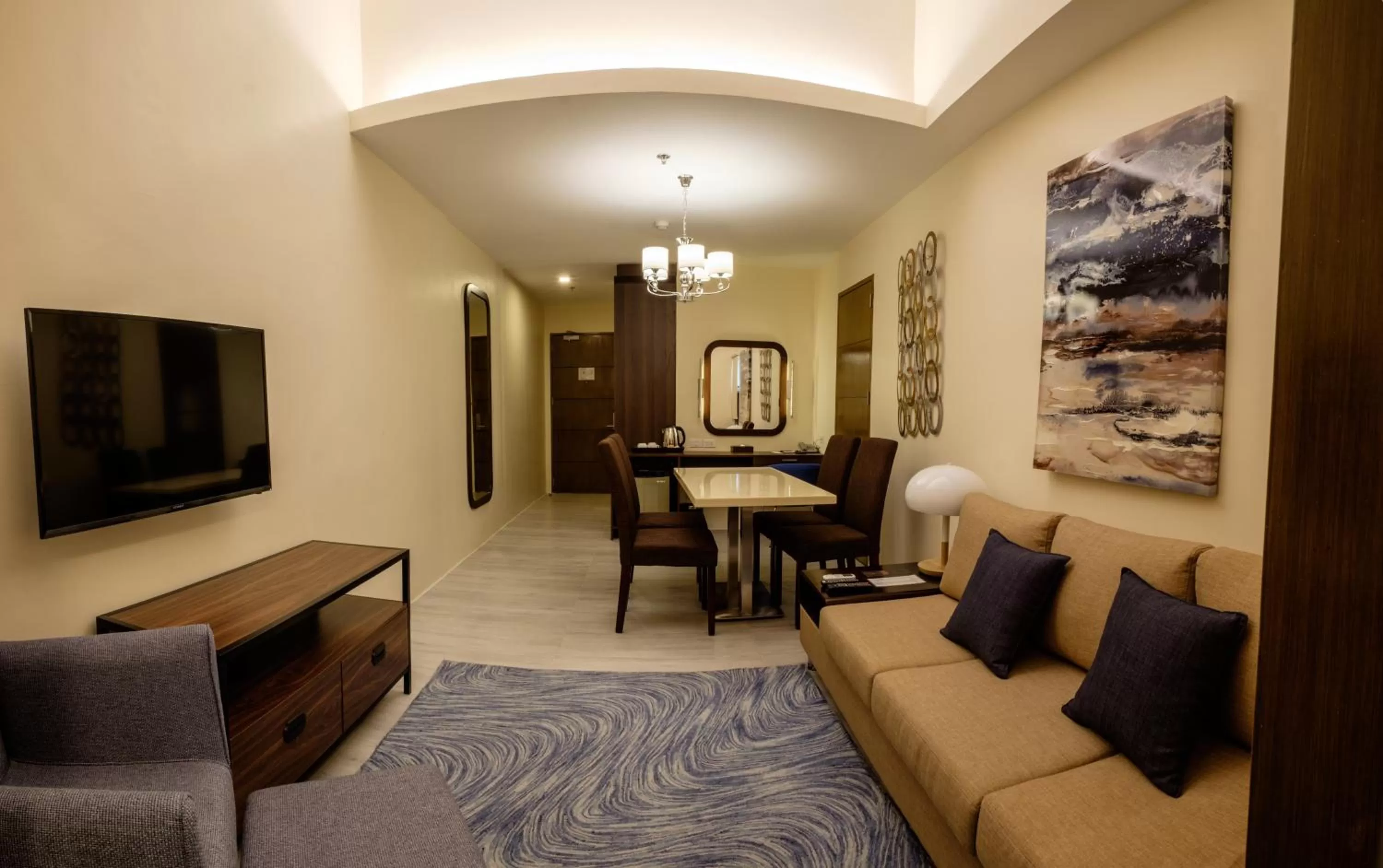 TV and multimedia in One Central Hotel & Suites