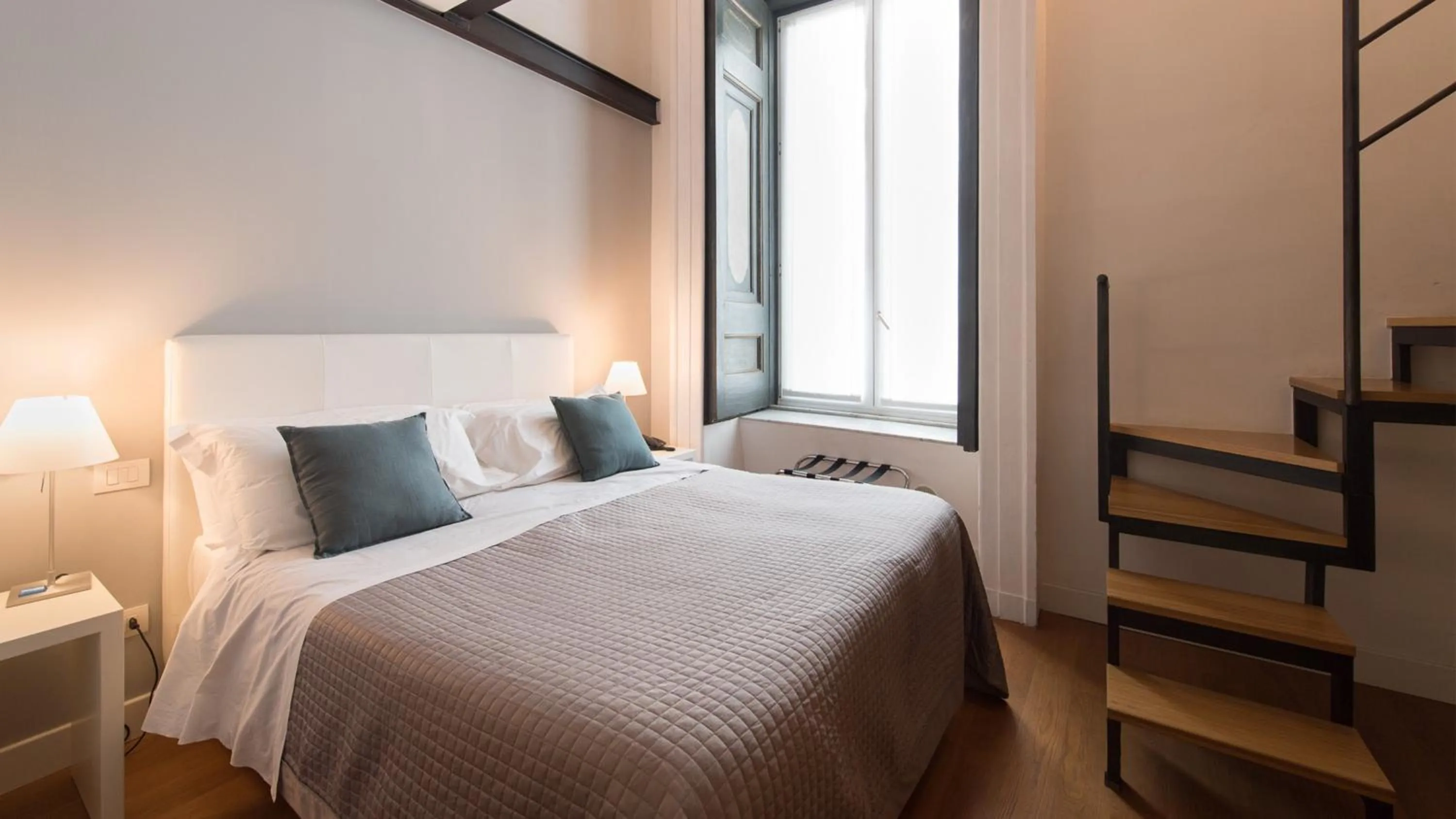 Bed in Santa Chiara Boutique Hotel