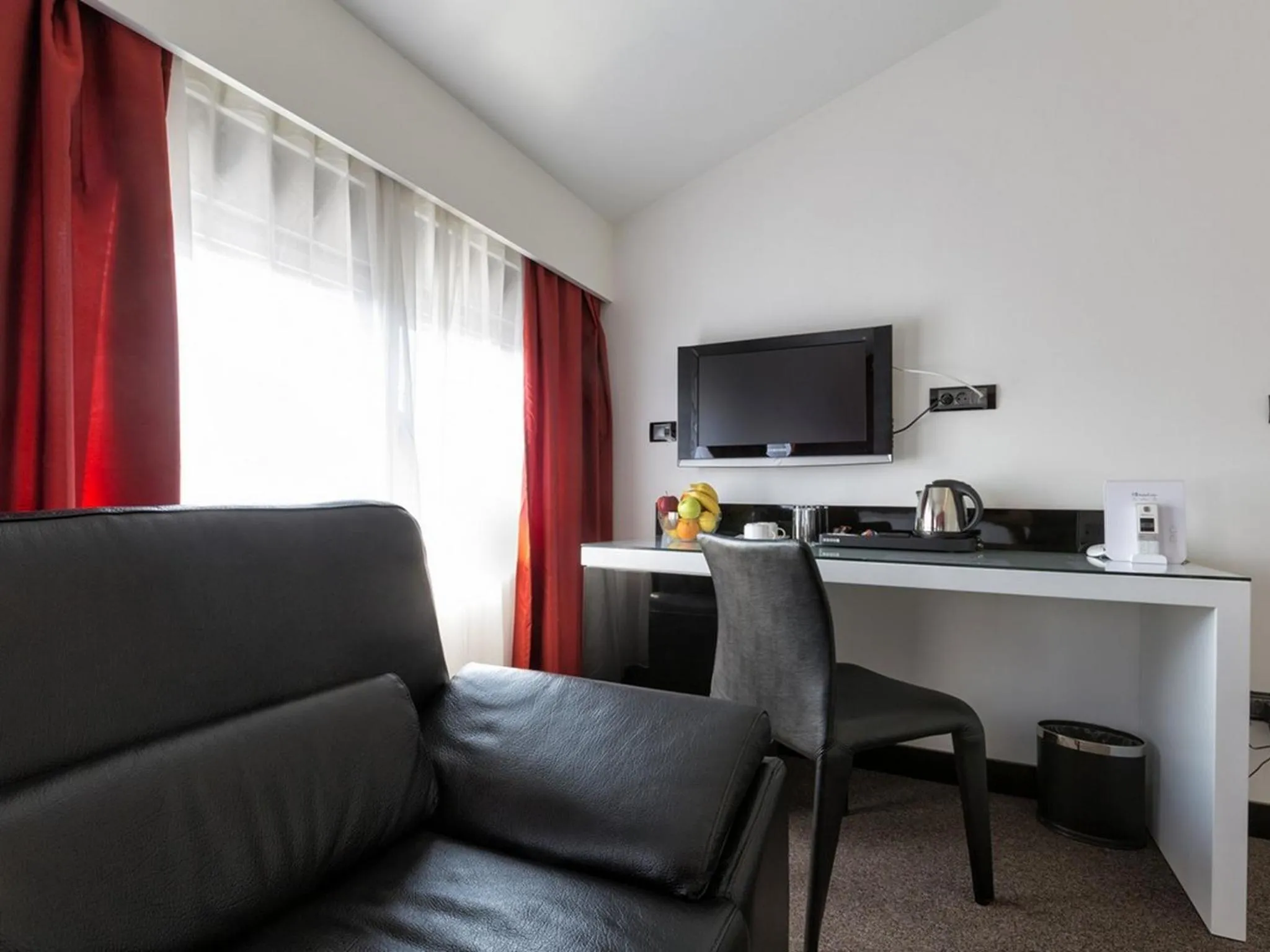 TV and multimedia in Nova City Garni Hotel Signature Collection