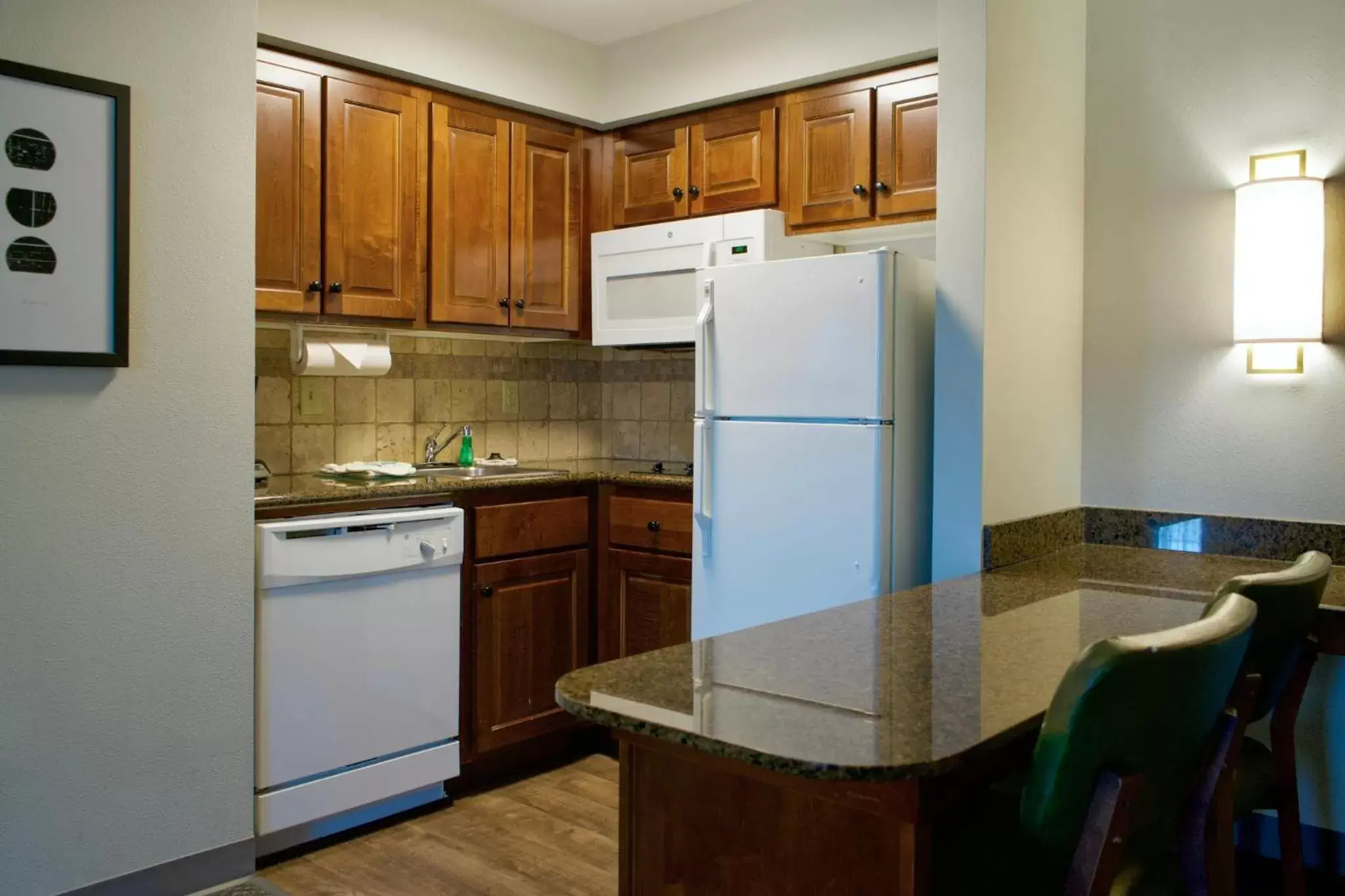 Bedroom, Kitchen/Kitchenette in Staybridge Suites Akron-Stow-Cuyahoga Falls, an IHG Hotel