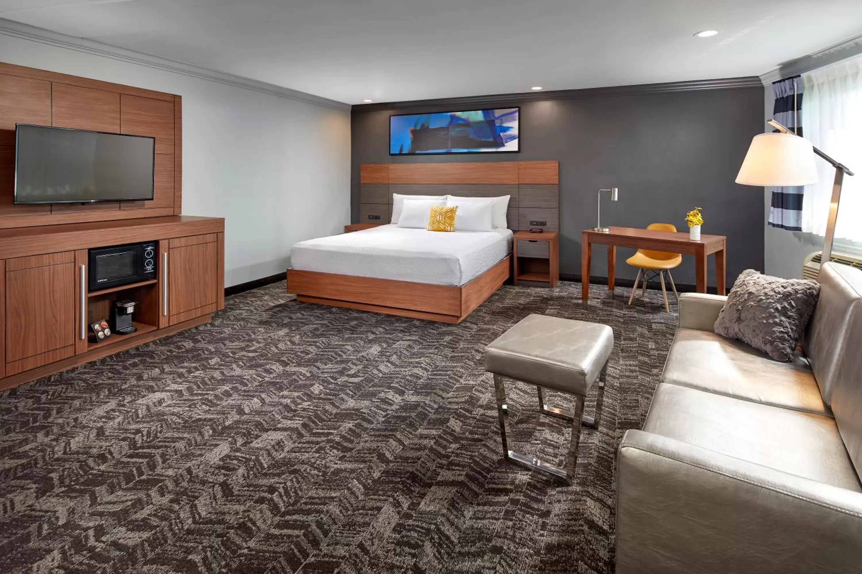 Bed in Studio Inn & Suites at Promenade Downey