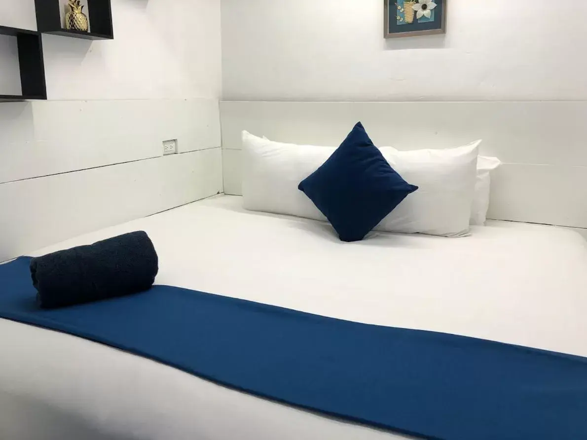 Bed in Beach Front TGR Hotels and Resorts