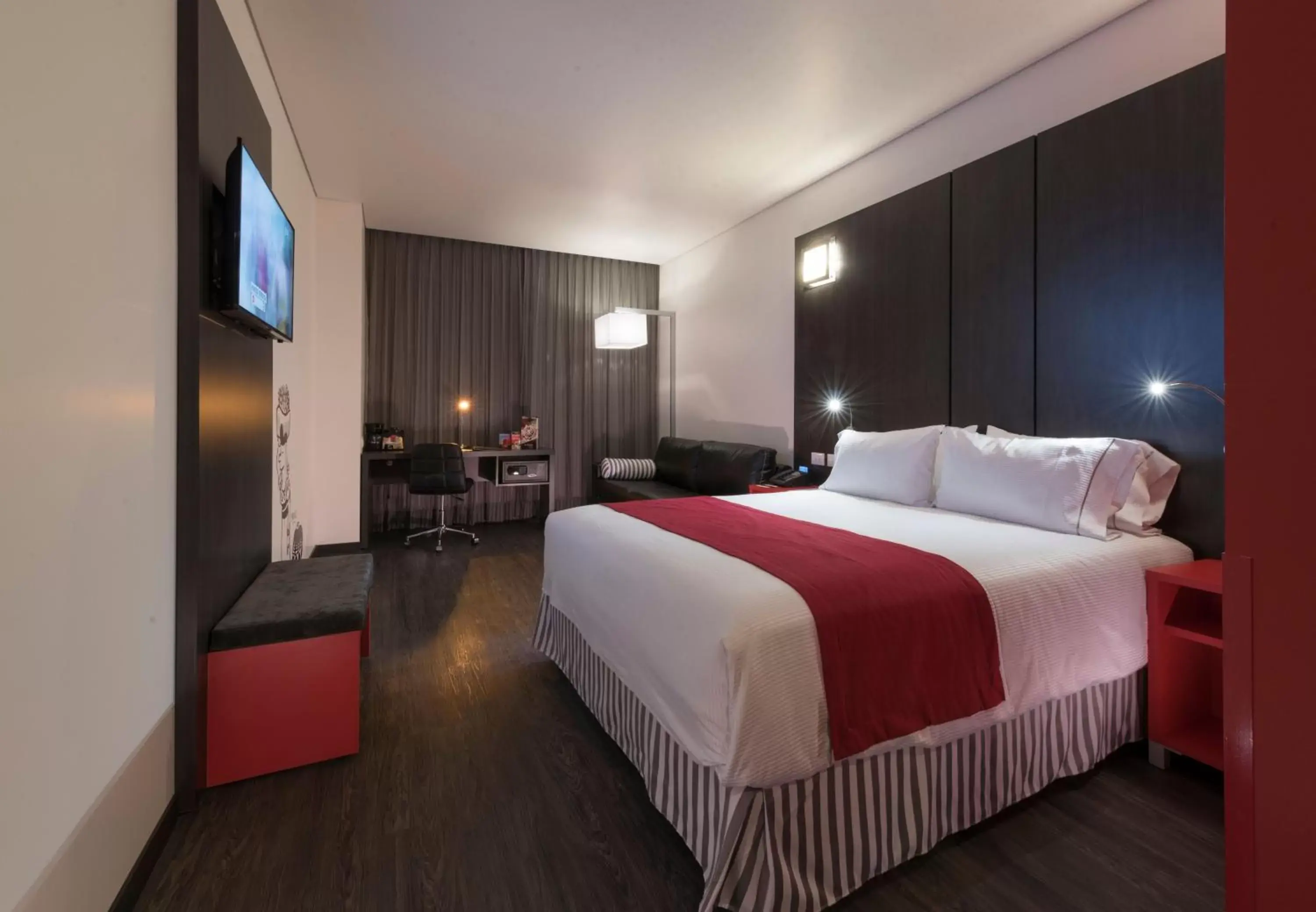 Bed in Ramada Encore by Wyndham Puebla