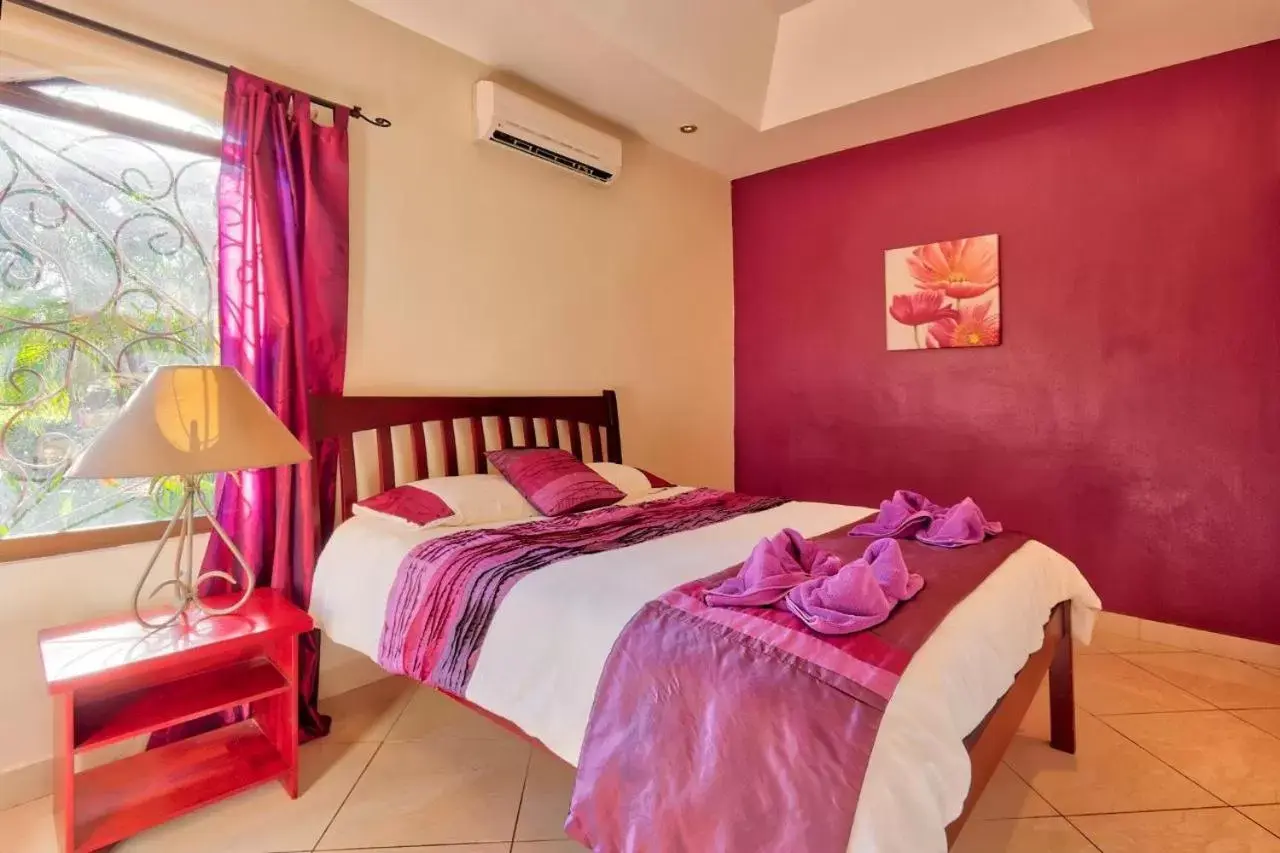 Bed in Las Brisas Resort and Villas