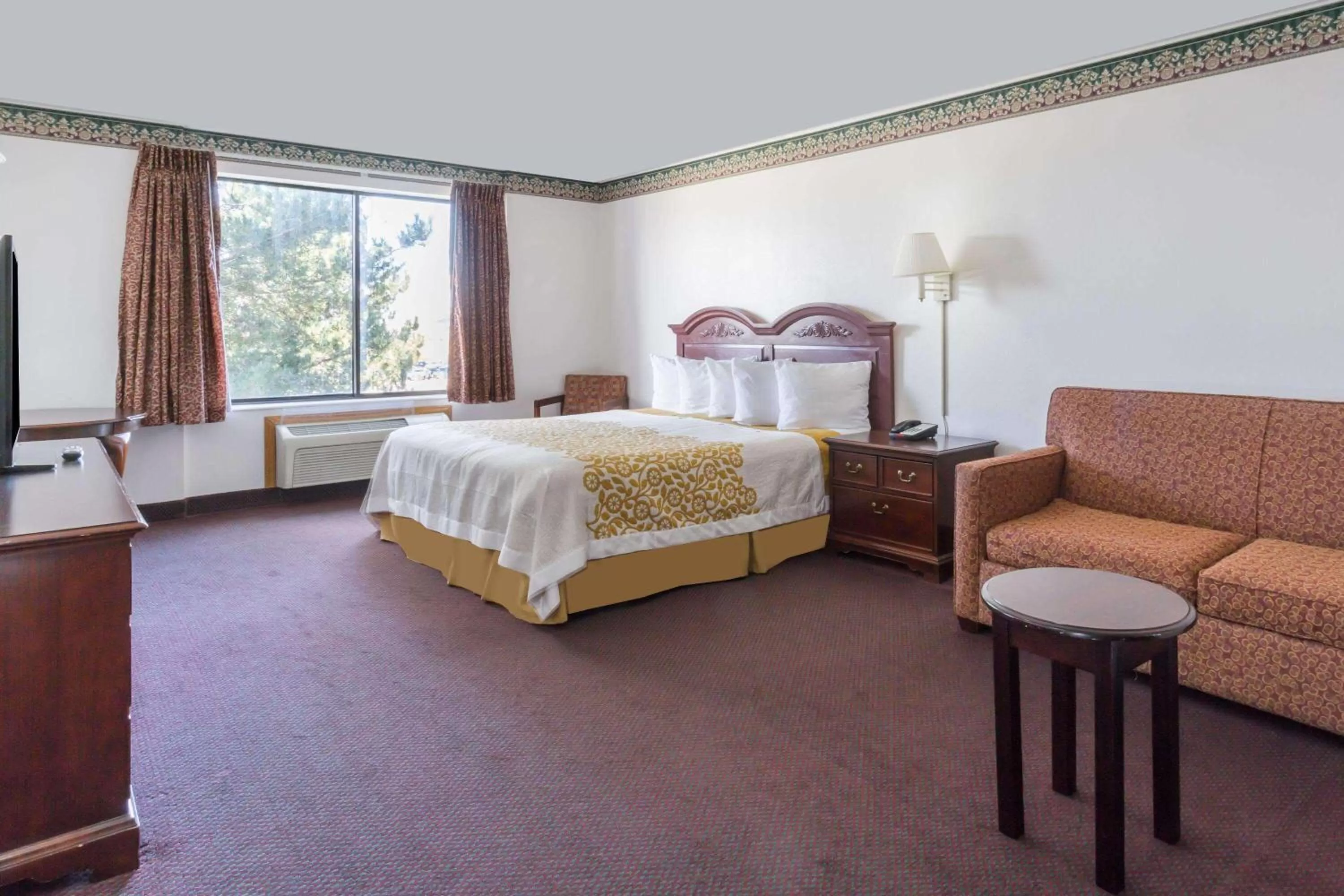 Photo of the whole room, Bed in Days Inn by Wyndham Evanston WY