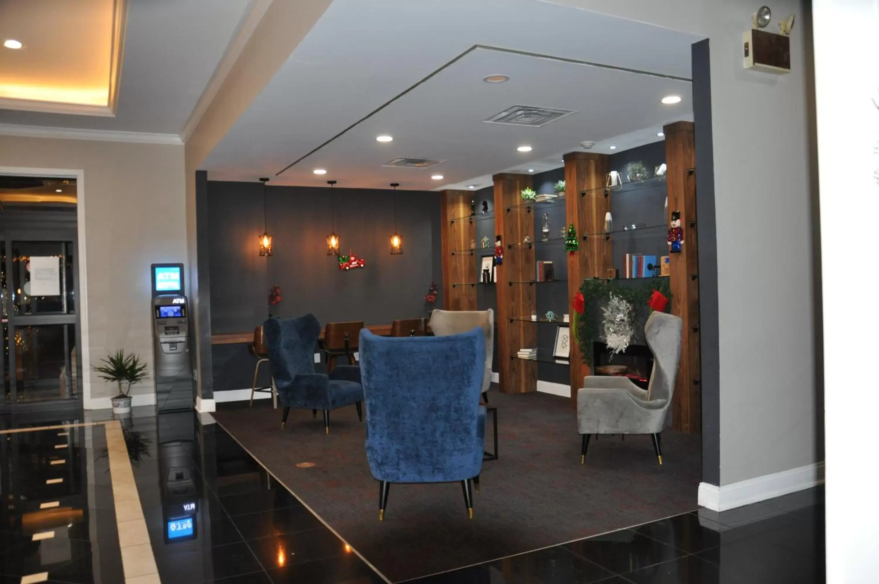 Communal lounge/ TV room, Lobby/Reception in Ramada by Wyndham Vineland Millville Area