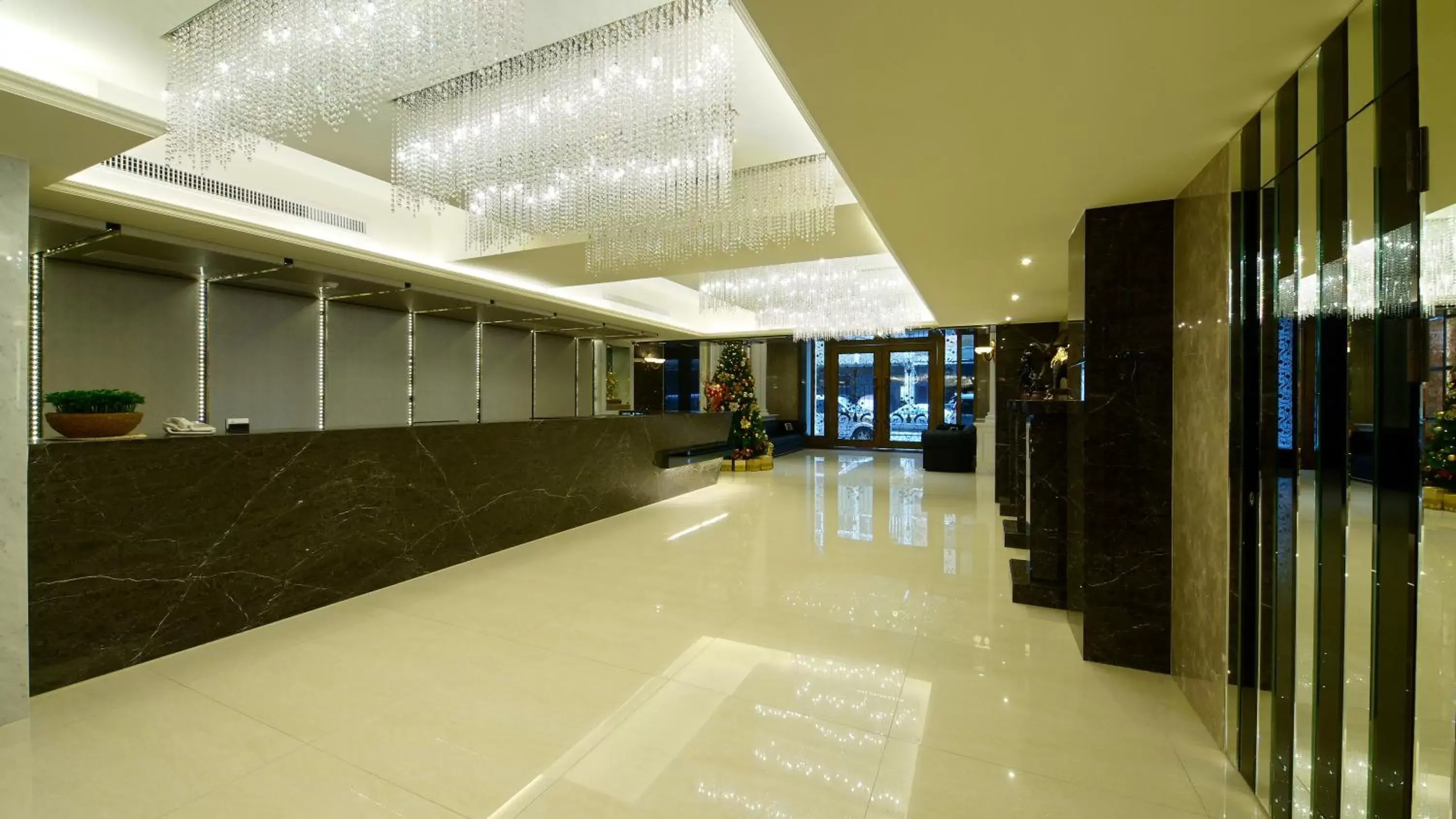Lobby or reception in Harmonious Hotel Lobby or reception in Harmonious Hotel