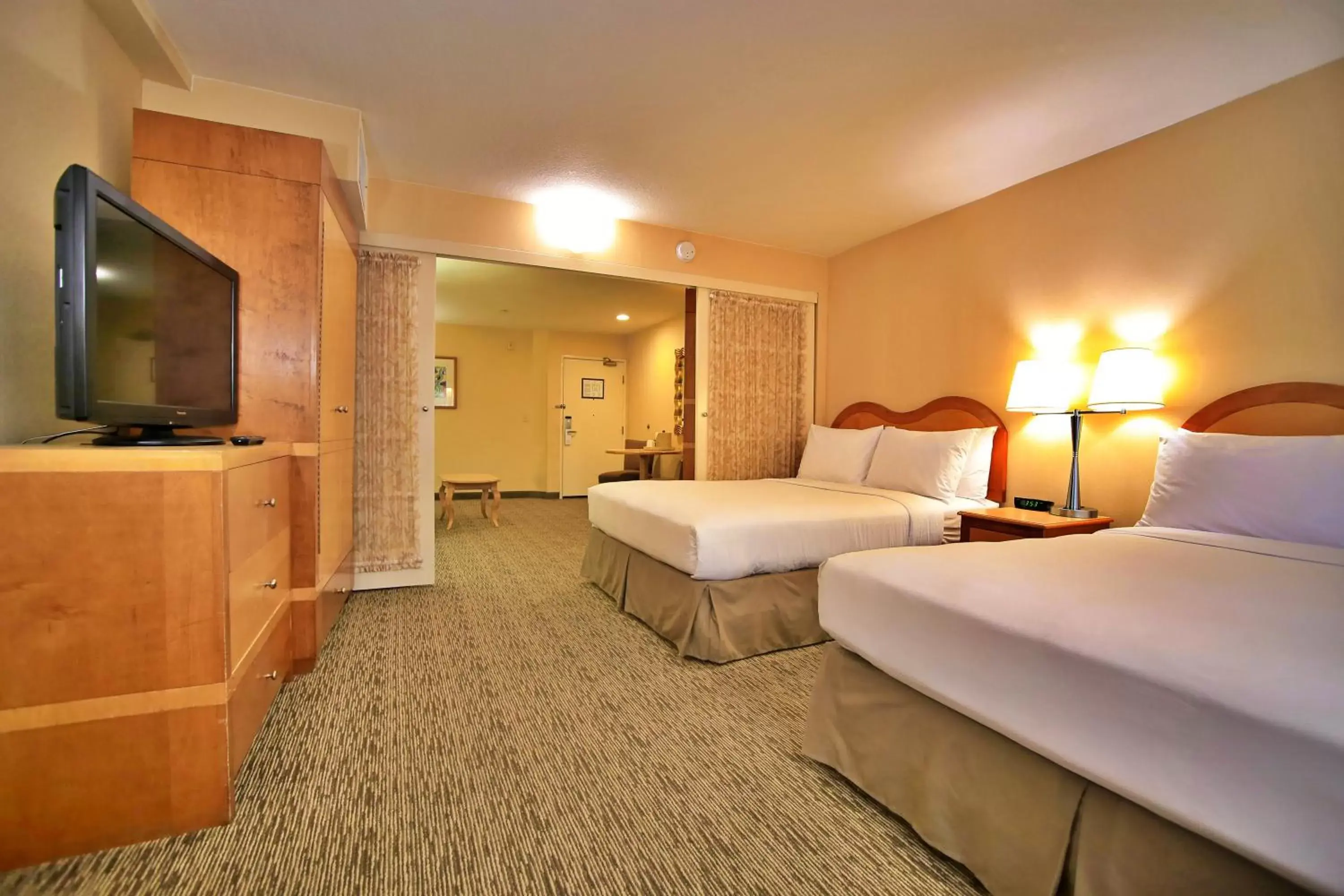 Bedroom in Portofino Inn and Suites Anaheim Hotel