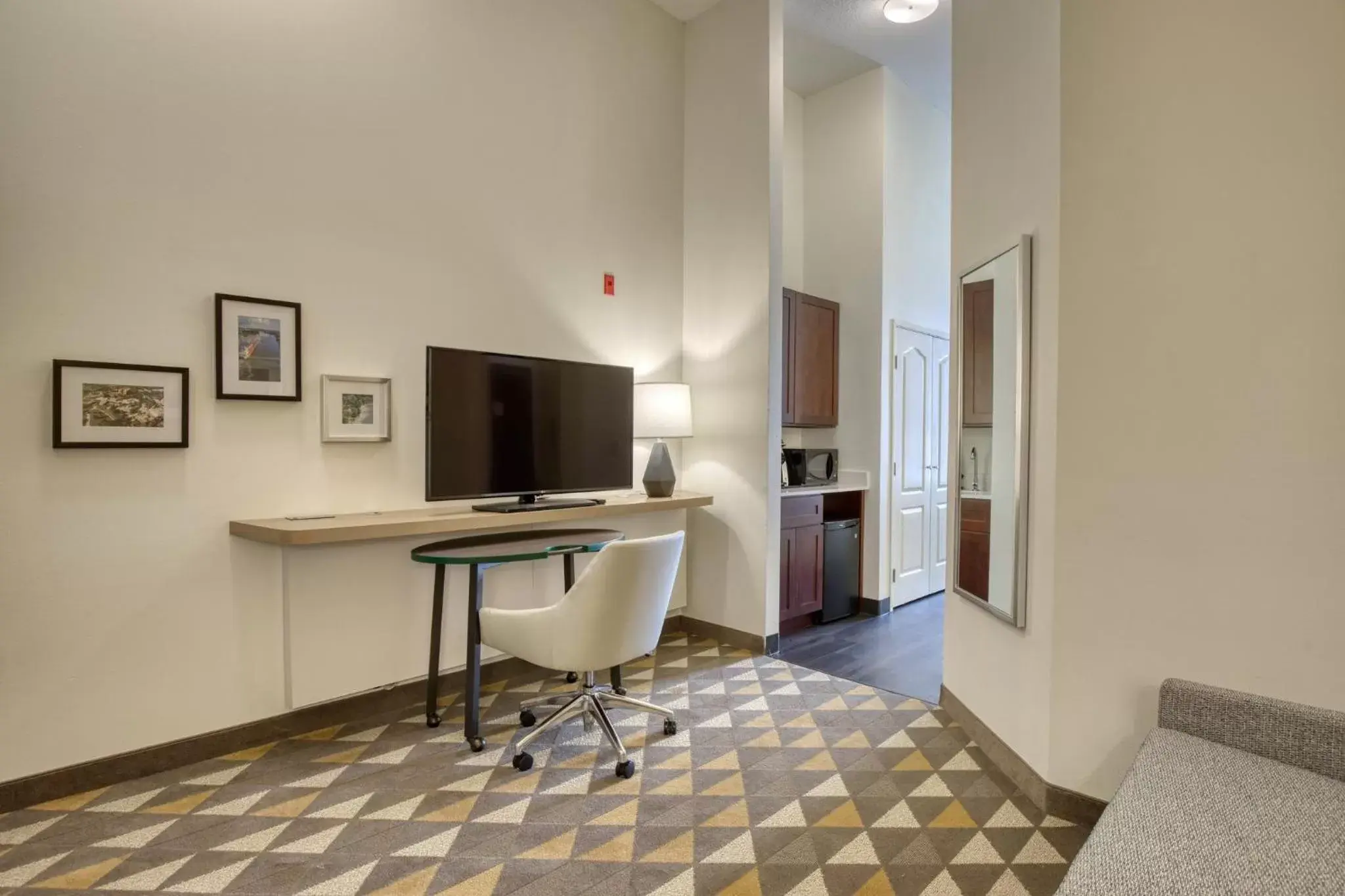 Photo of the whole room, TV/Entertainment Center in Holiday Inn Hotel & Suites Madison West, an IHG Hotel