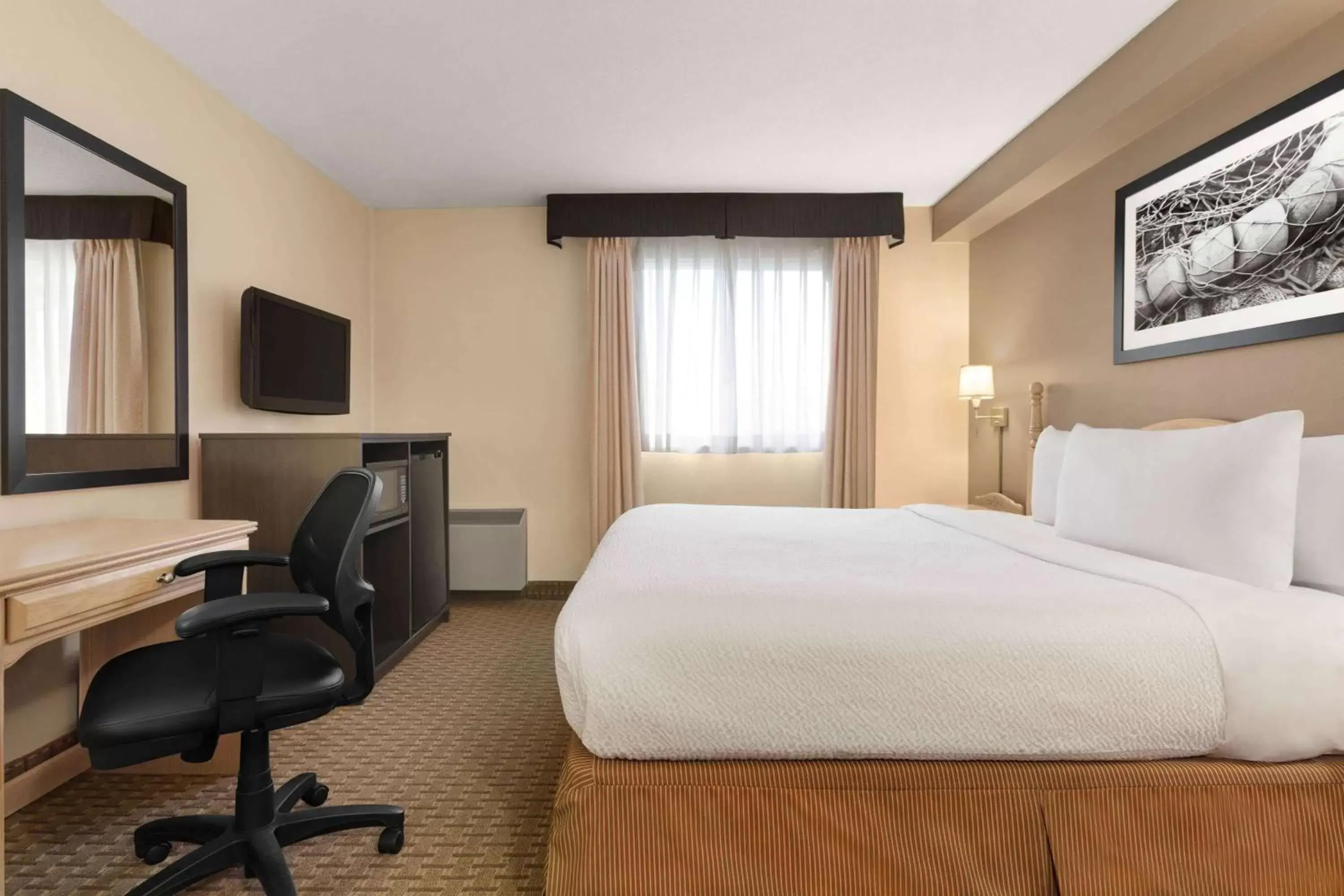 Photo of the whole room in Travelodge Suites by Wyndham Moncton