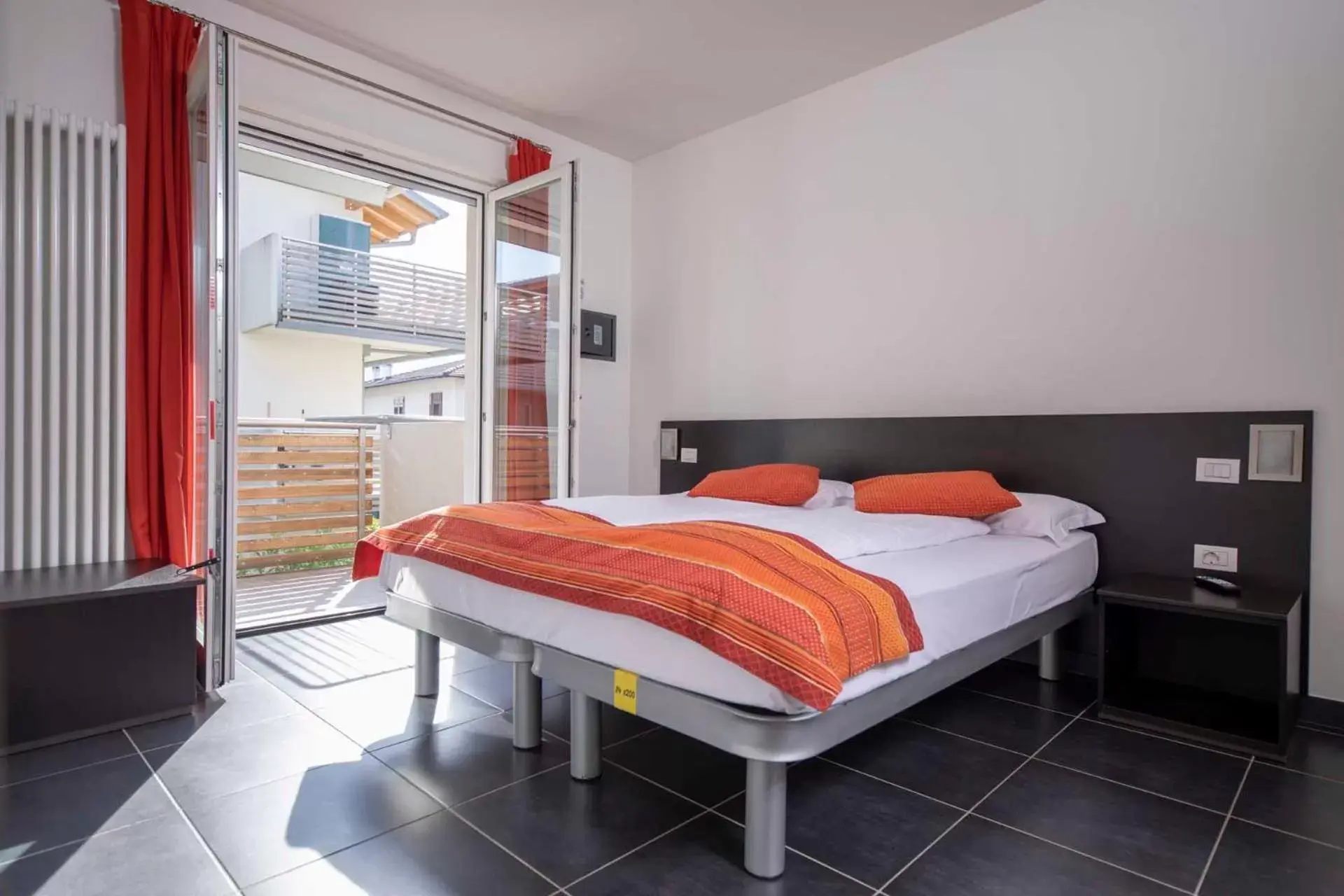 Bed in 4 Limoni Apartment Resort