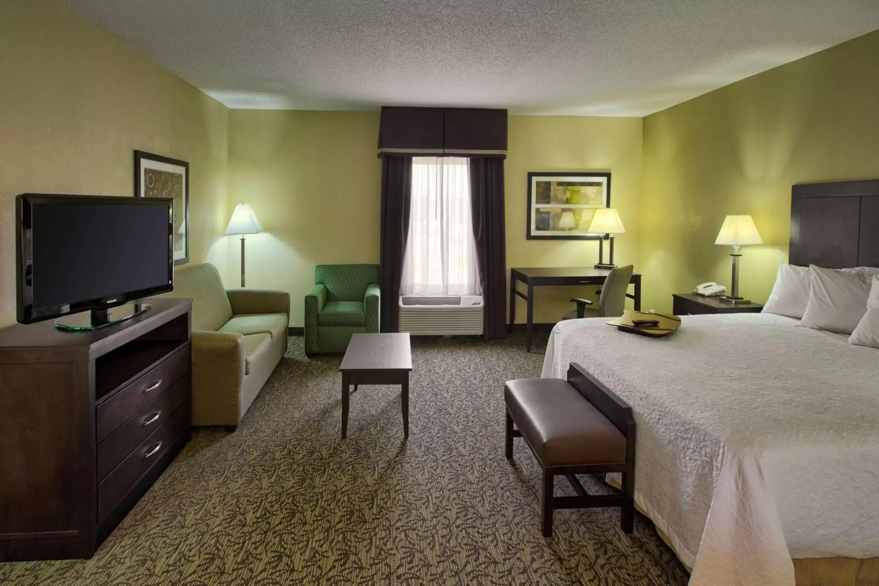 Bed, TV/Entertainment Center in Hampton Inn Mebane