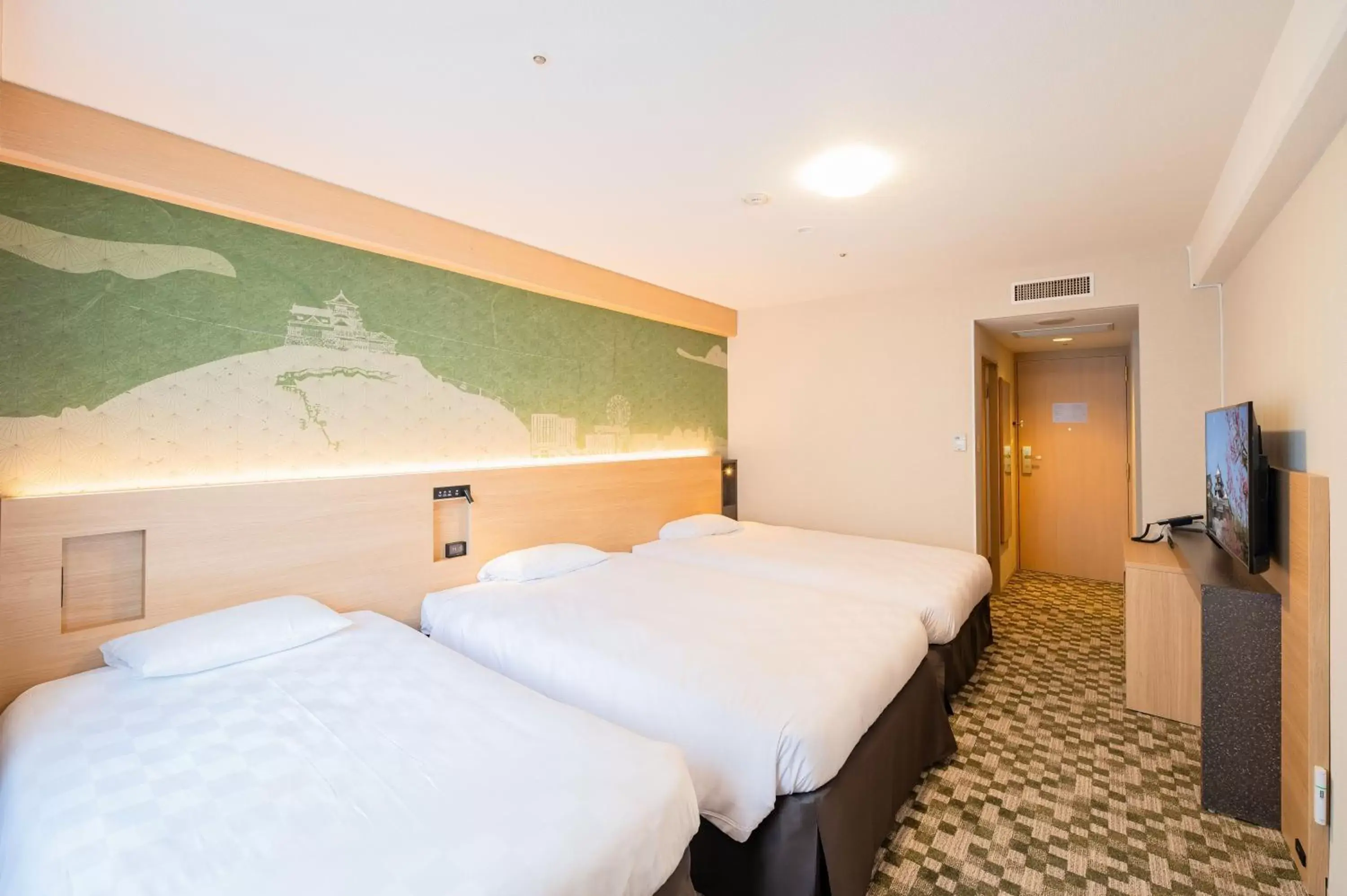 Bed in Matsuyama Tokyu REI Hotel Bed in Matsuyama Tokyu REI Hotel