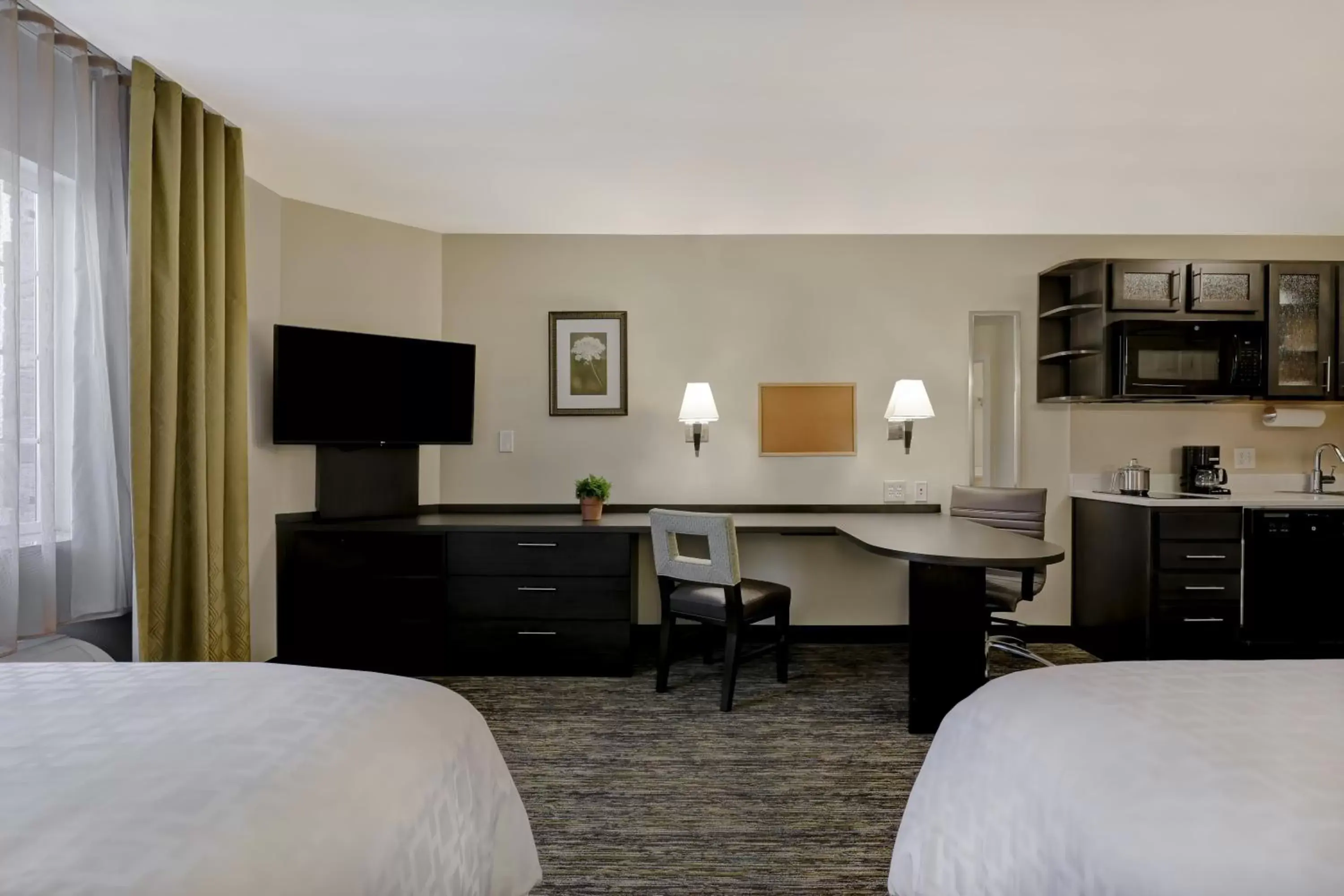 Bedroom, TV/Entertainment Center in Candlewood Suites Indianapolis - South, an IHG Hotel