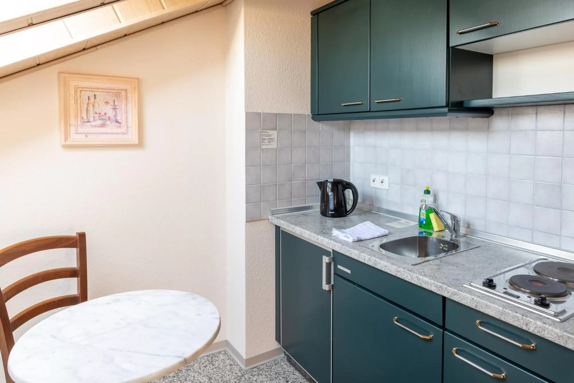 Kitchen or kitchenette in Residenz Royal