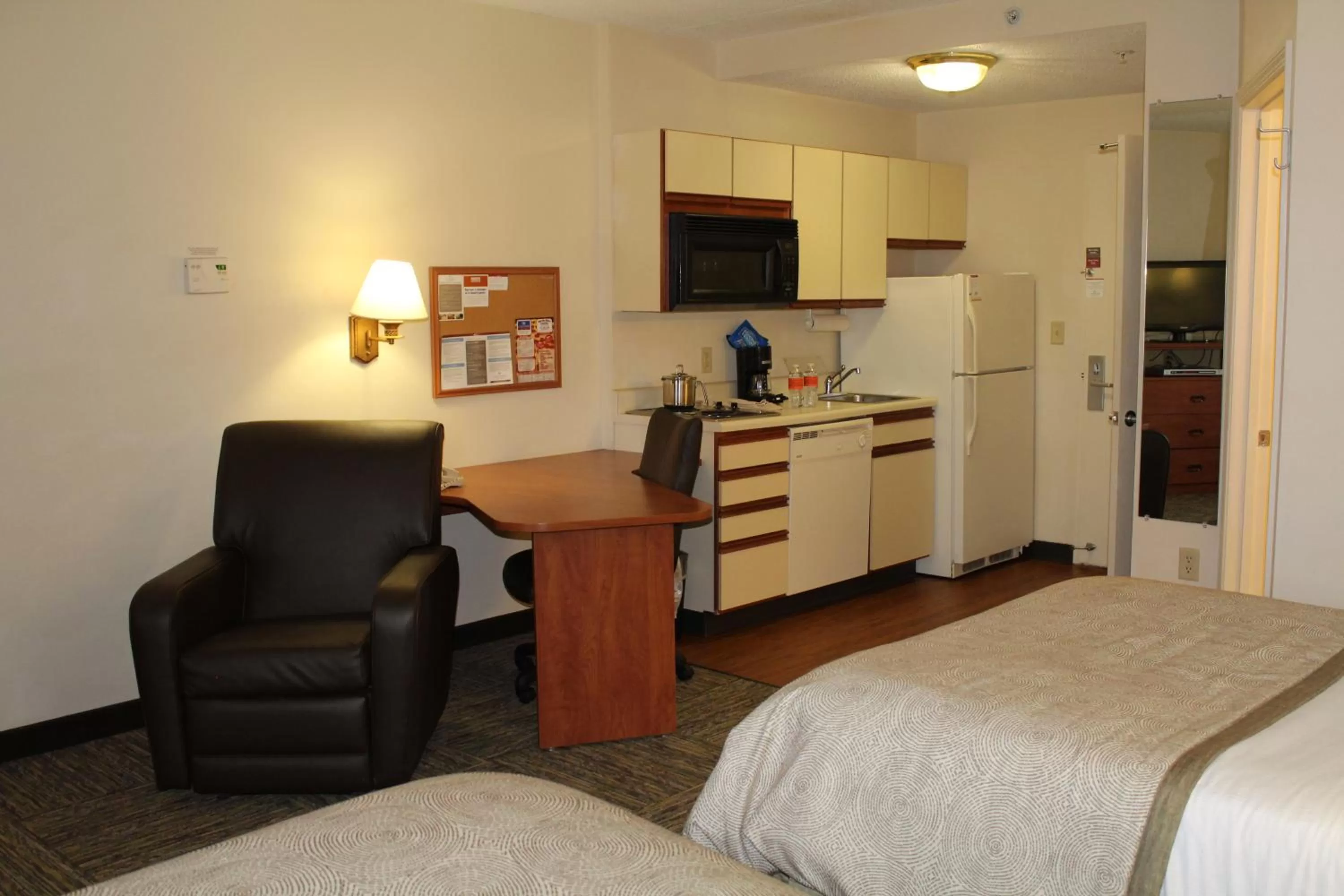 Photo of the whole room, Bed in Candlewood Suites Syracuse-Airport by IHG